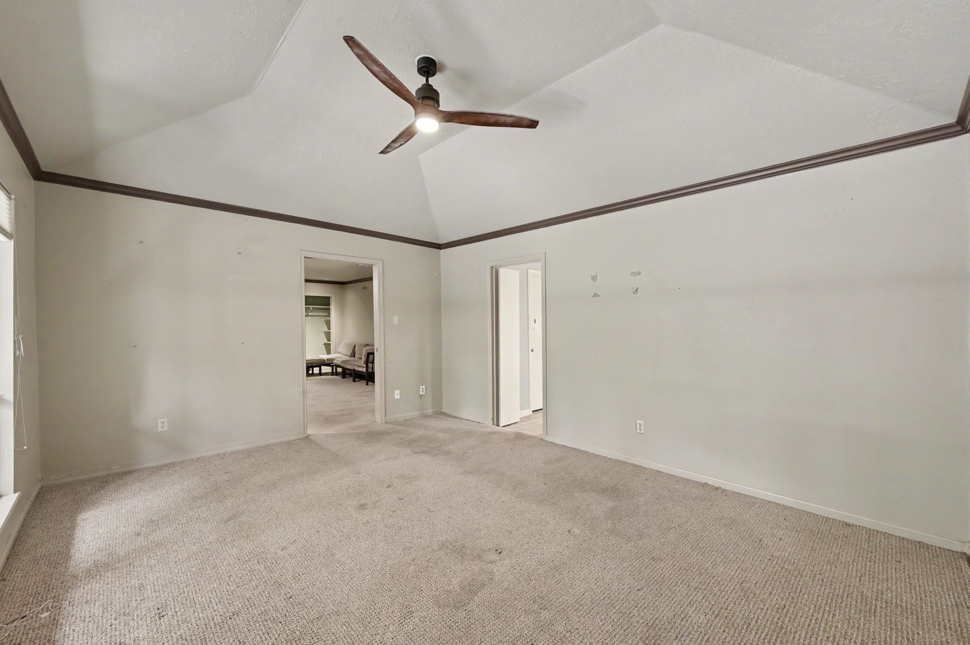 2710 N Logrun Circle, The Woodlands, TX 77380 A large Primary Bedroom is at the back of the house.