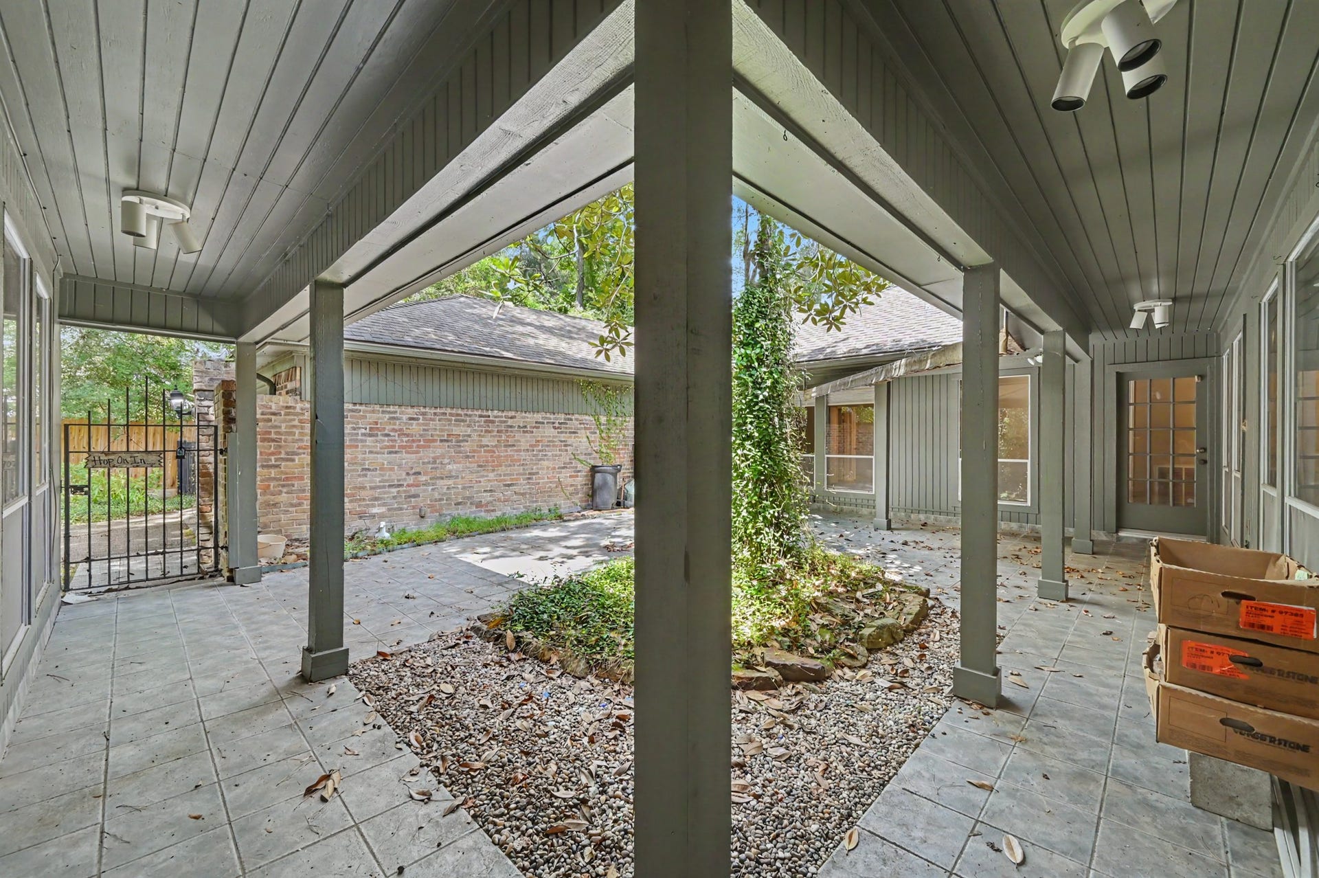 2710 N Logrun Circle, The Woodlands, TX 77380 In the center of the house is the courtyard, which can be described as a "square doughnut".