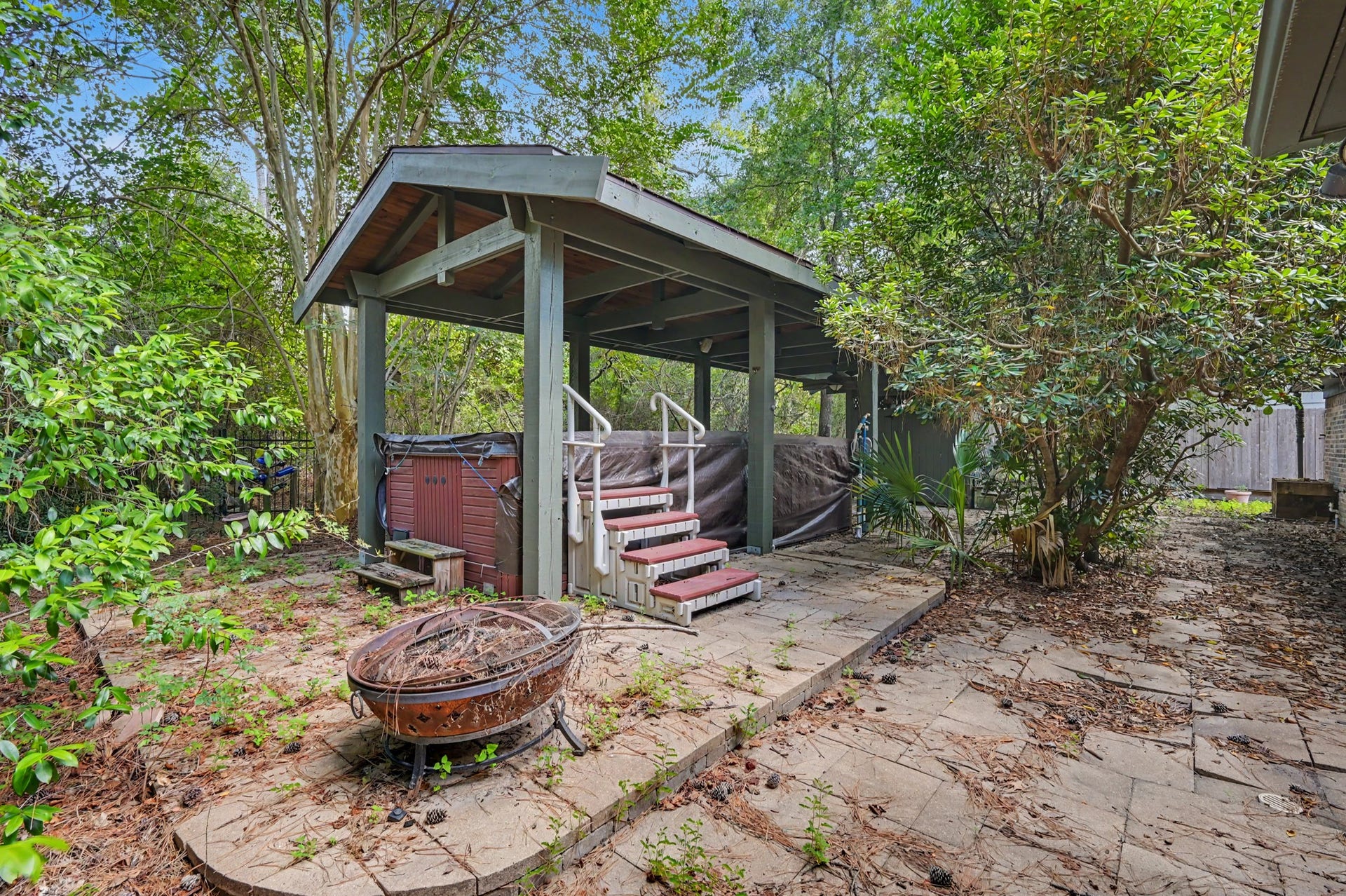 2710 N Logrun Circle, The Woodlands, TX 77380 There is a well made cover that is over the Swim Spa, that is covered, but still works.
