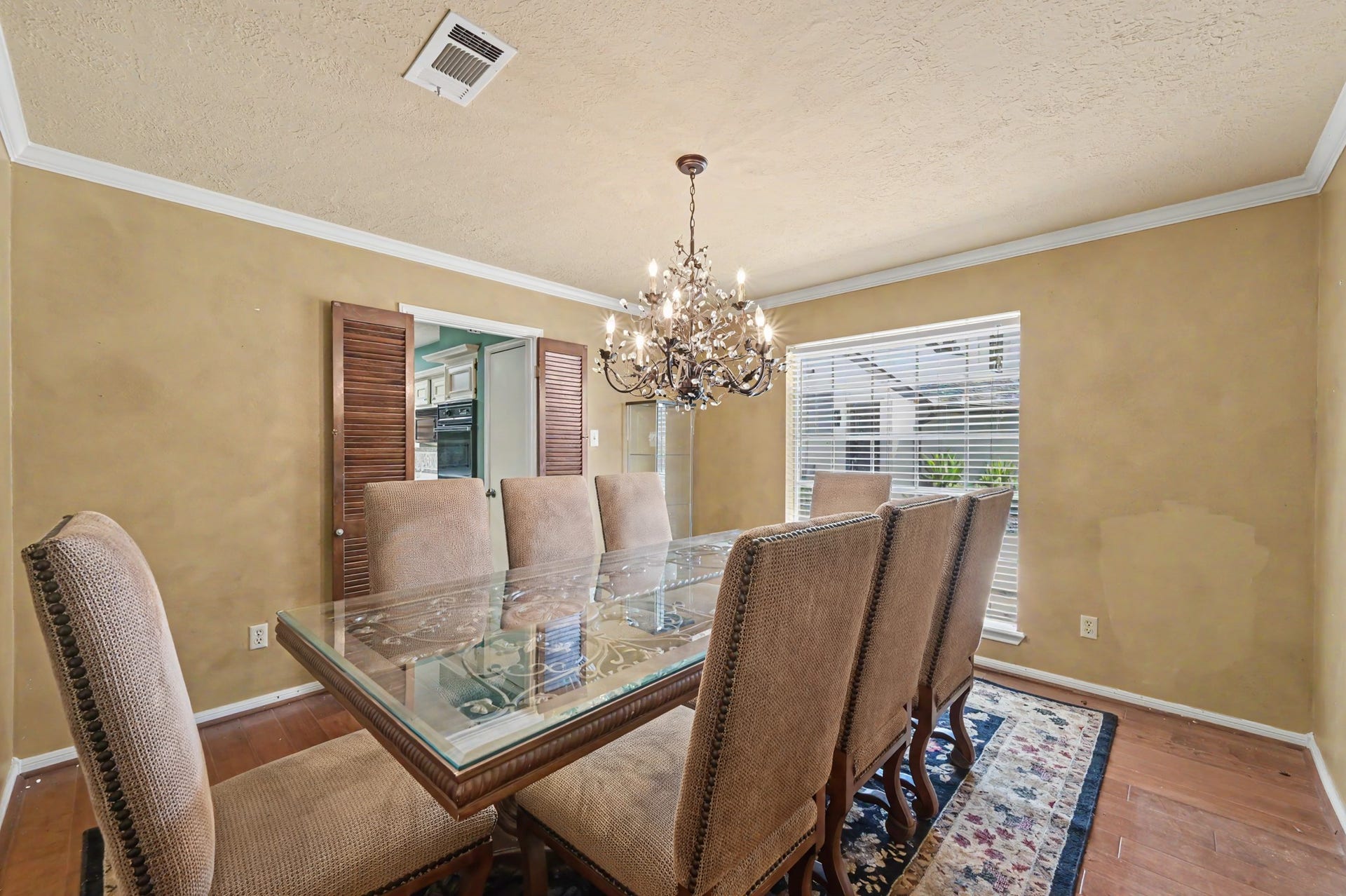 2710 N Logrun Circle, The Woodlands, TX 77380 Across the hallway is the large Dining Room. The furniture will be removed.