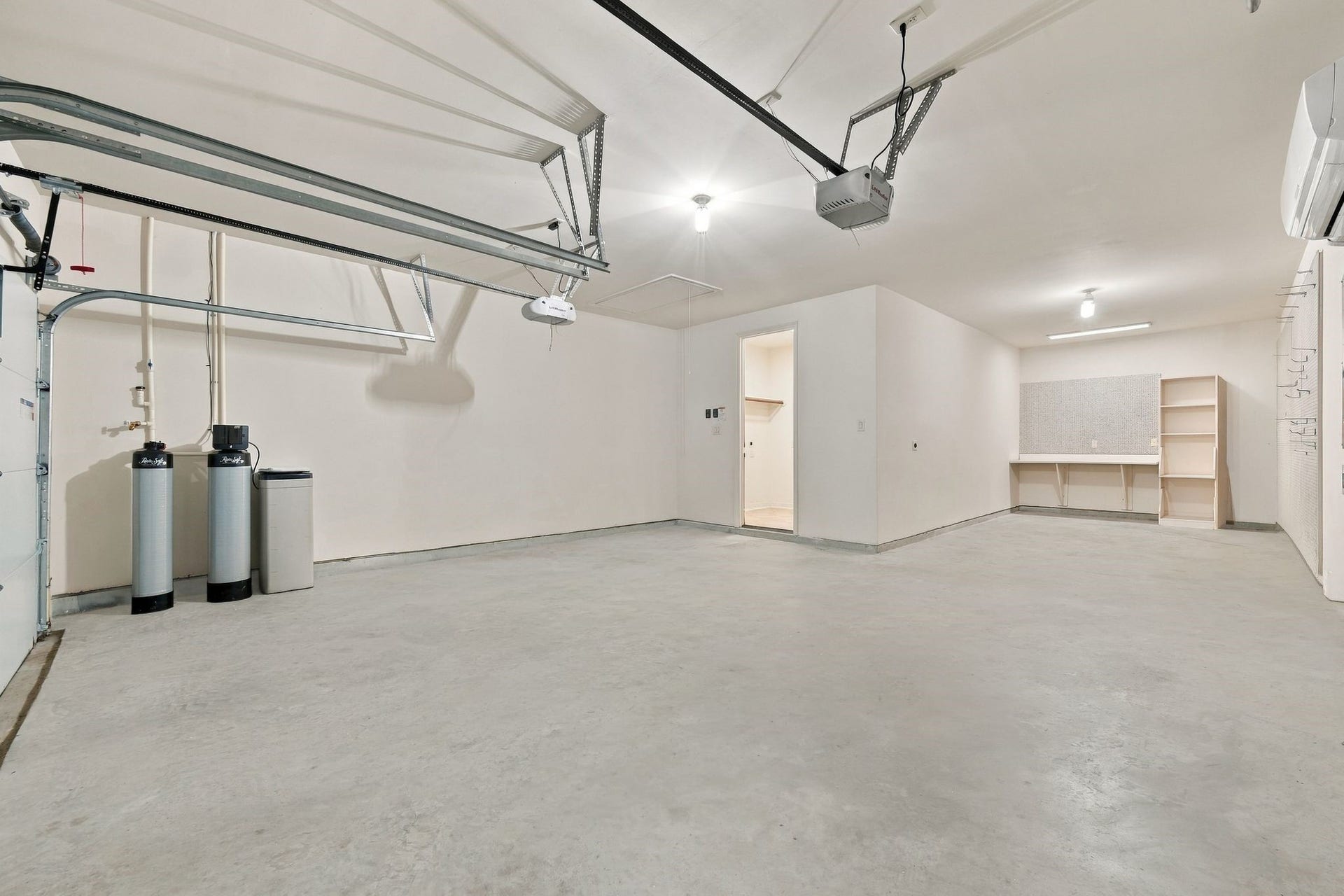 Heated and cooled garage.