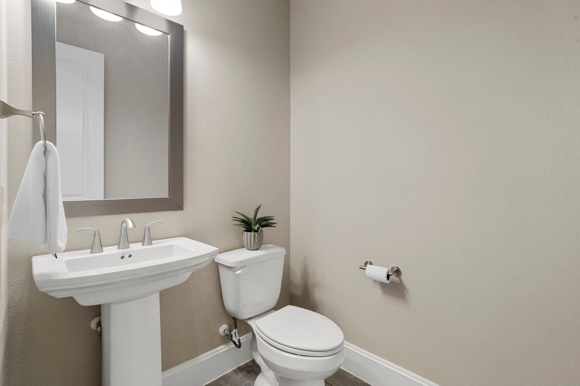 9410 Mount Logan, Missouri City, TX 77459 A downstairs powder bath is perfect for guests.