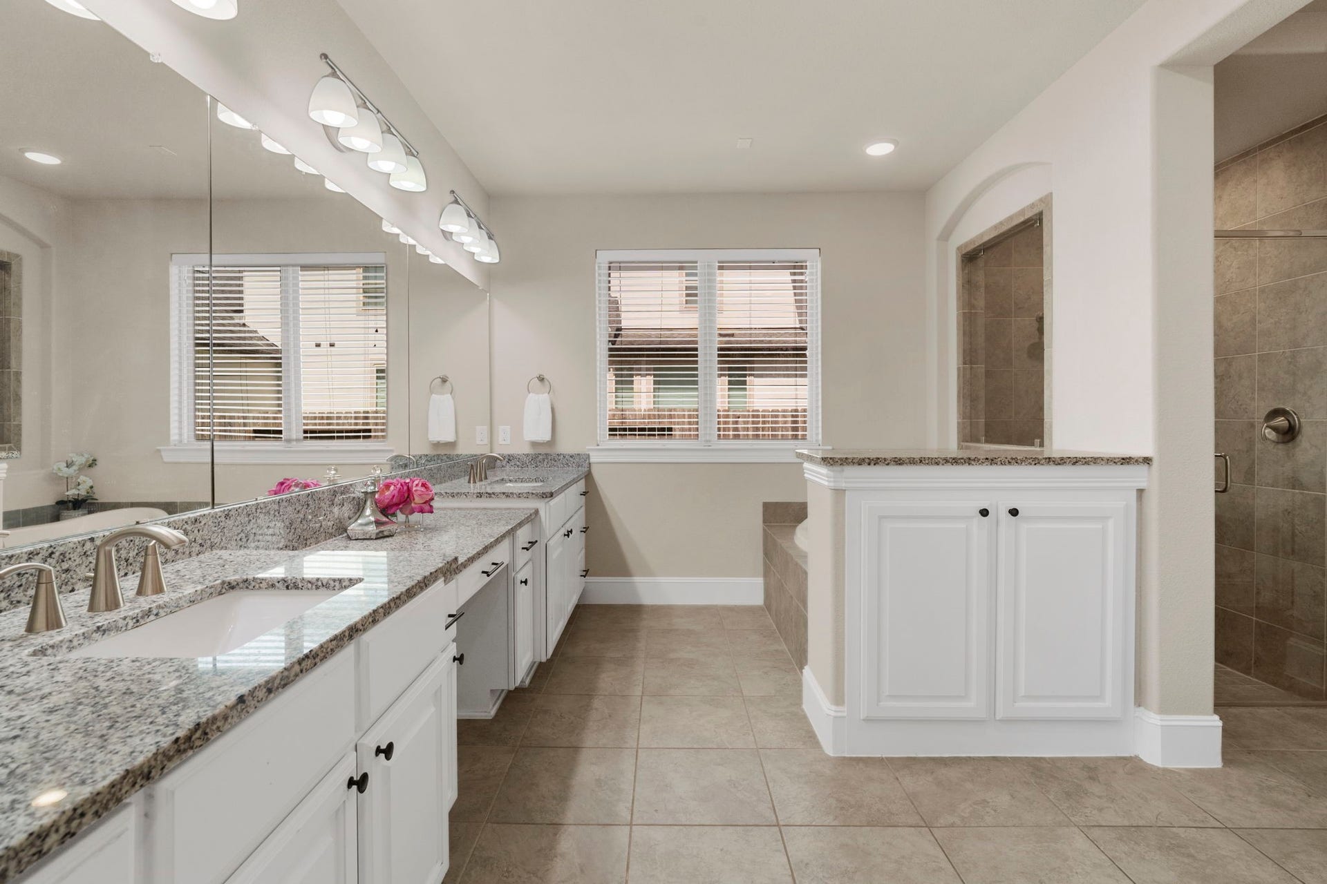 9410 Mount Logan, Missouri City, TX 77459 Double sinks, sitting vanity area and an abundance of storage space.