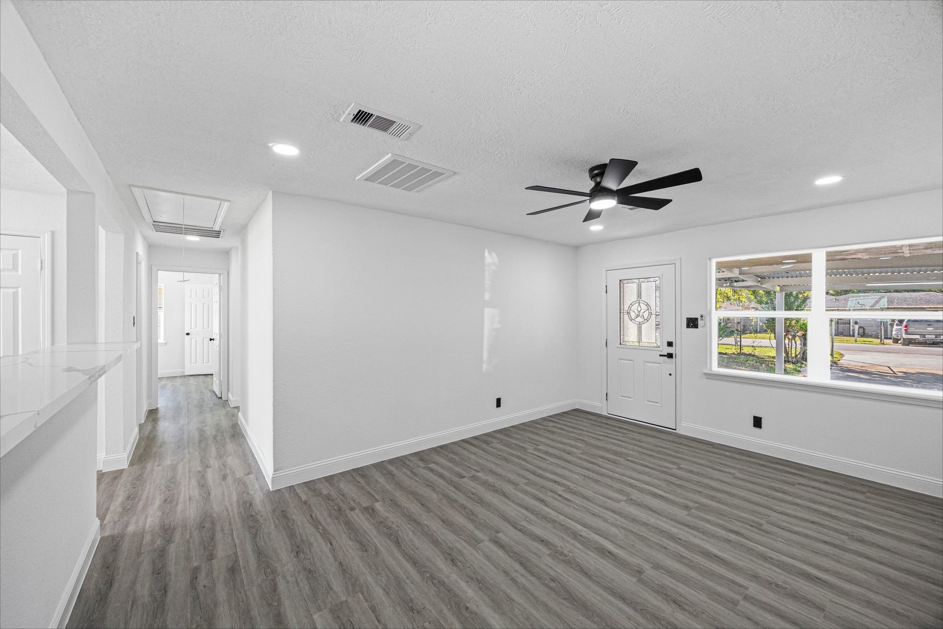 Living room & hallway to 3 bedrooms