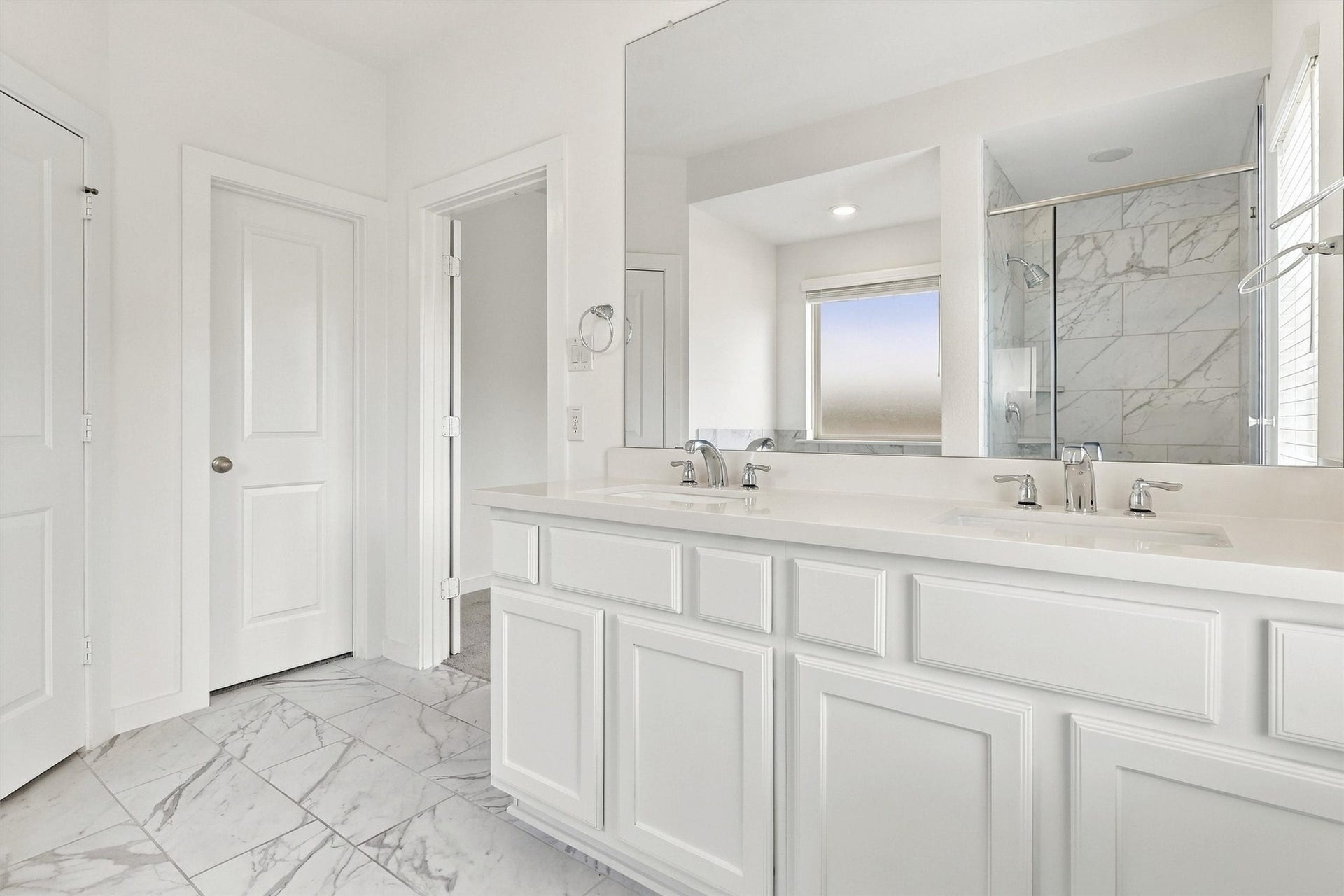 13109 Blue Flora Drive, Texas City, TX 77568 Walk-in closet is through the primary bath.