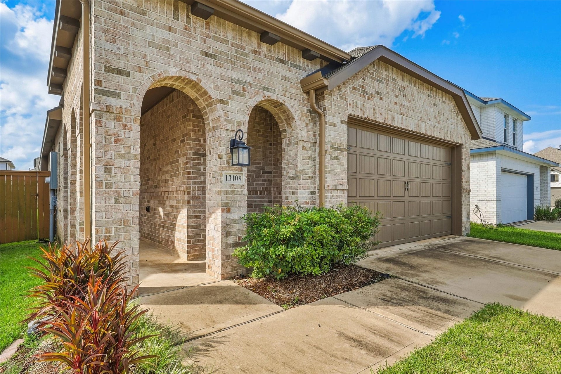 13109 Blue Flora Drive, Texas City, TX 77568 Welcome home to 13109 Blue Flora! This beautiful all-brick Highland Home is a charming gem in one of the coveted GATED sections of LAGO MAR!