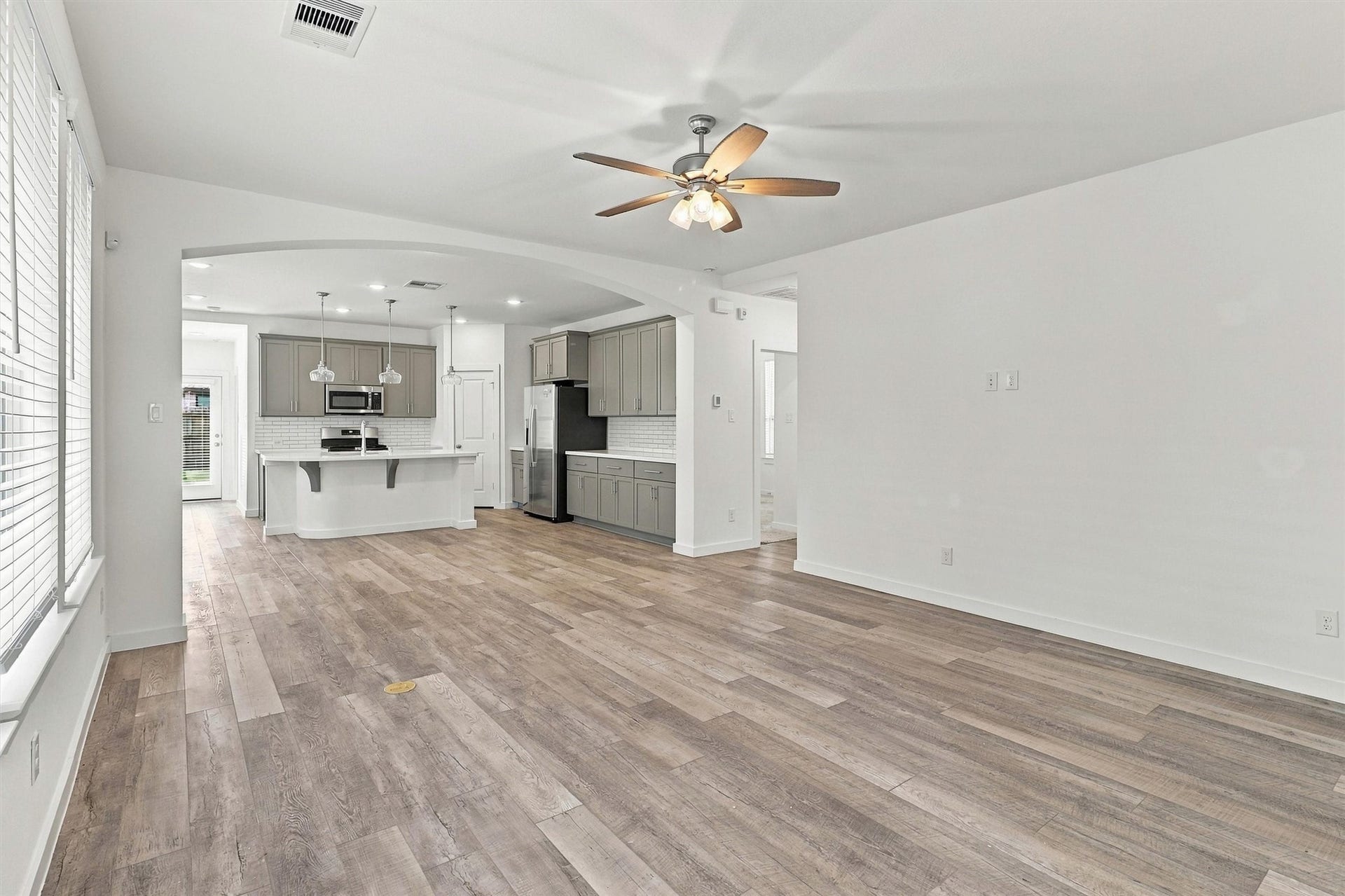 13109 Blue Flora Drive, Texas City, TX 77568 Walk into the home to see lots of natural light, large windows, beautiful LVP flooring, and a gorgeous open floor plan perfect for entertaining!