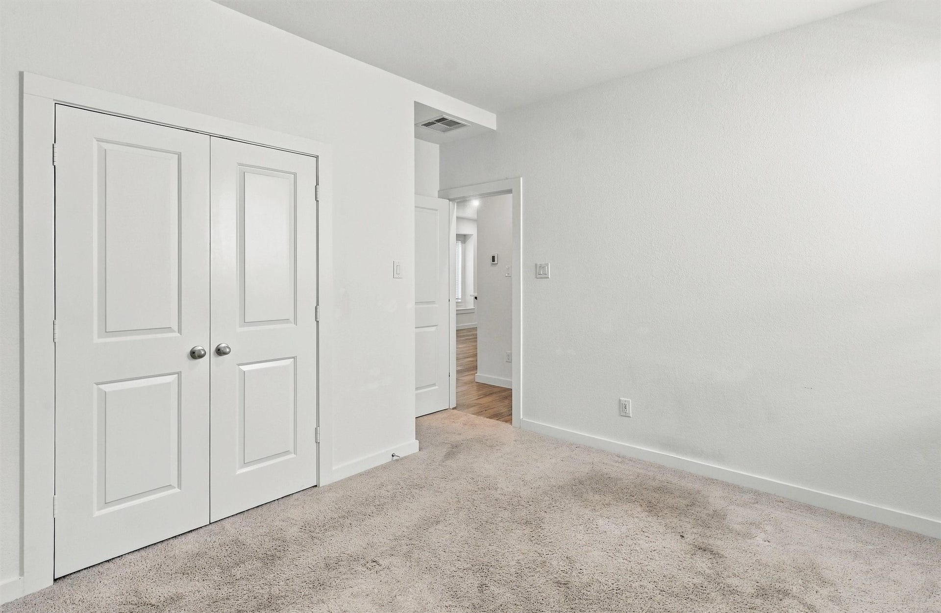 13109 Blue Flora Drive, Texas City, TX 77568 Second bedroom, features carpet and large closet.