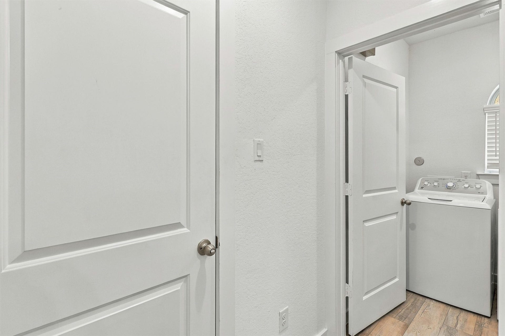 13109 Blue Flora Drive, Texas City, TX 77568 Garage entry and laundry room.