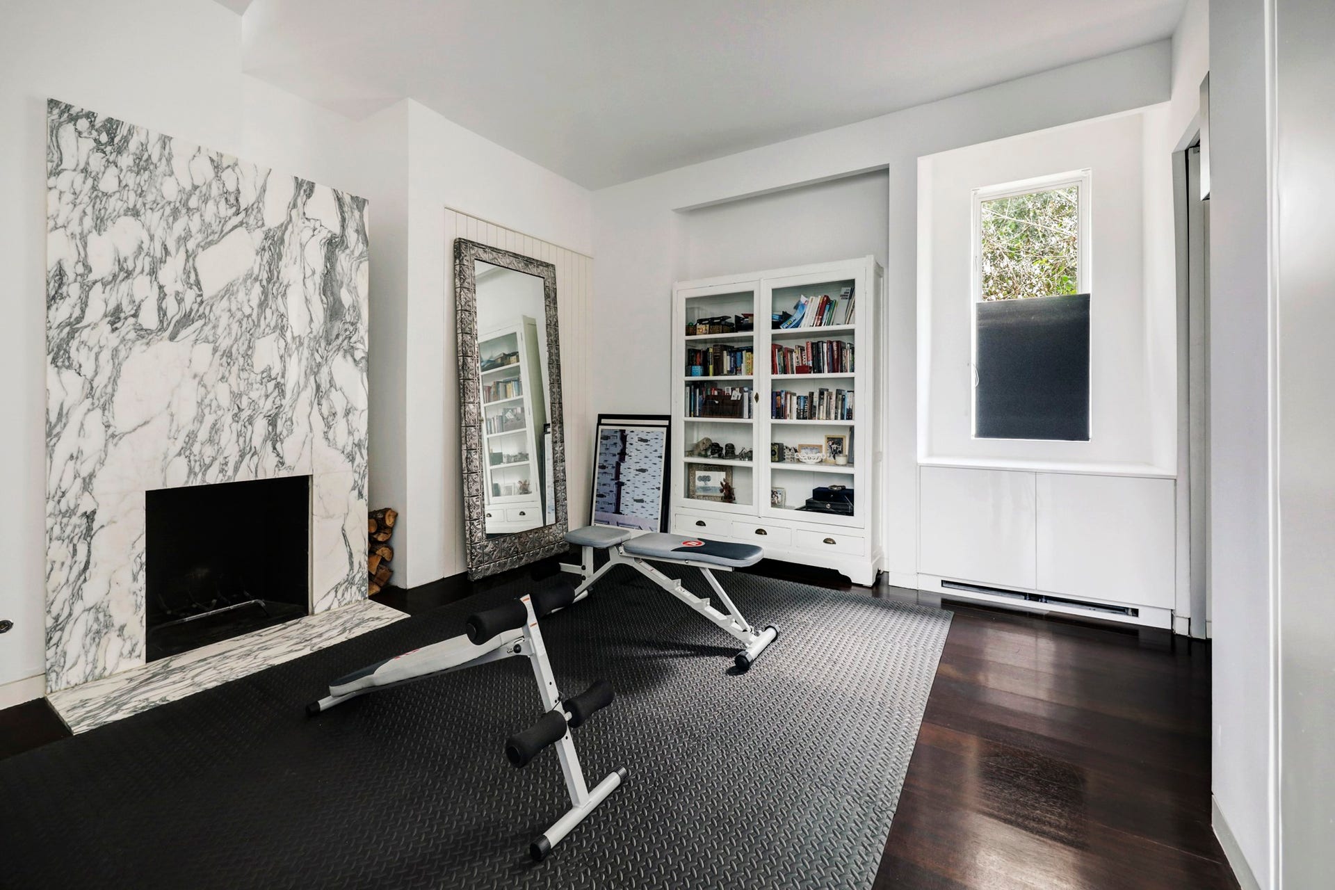 2200 Harvard Street, Houston, TX 77008 Bedroom, home gym, library, office - this amazing flex space features a fireplace, storage, and access to the ensuite Jack-and-Jill bathroom.