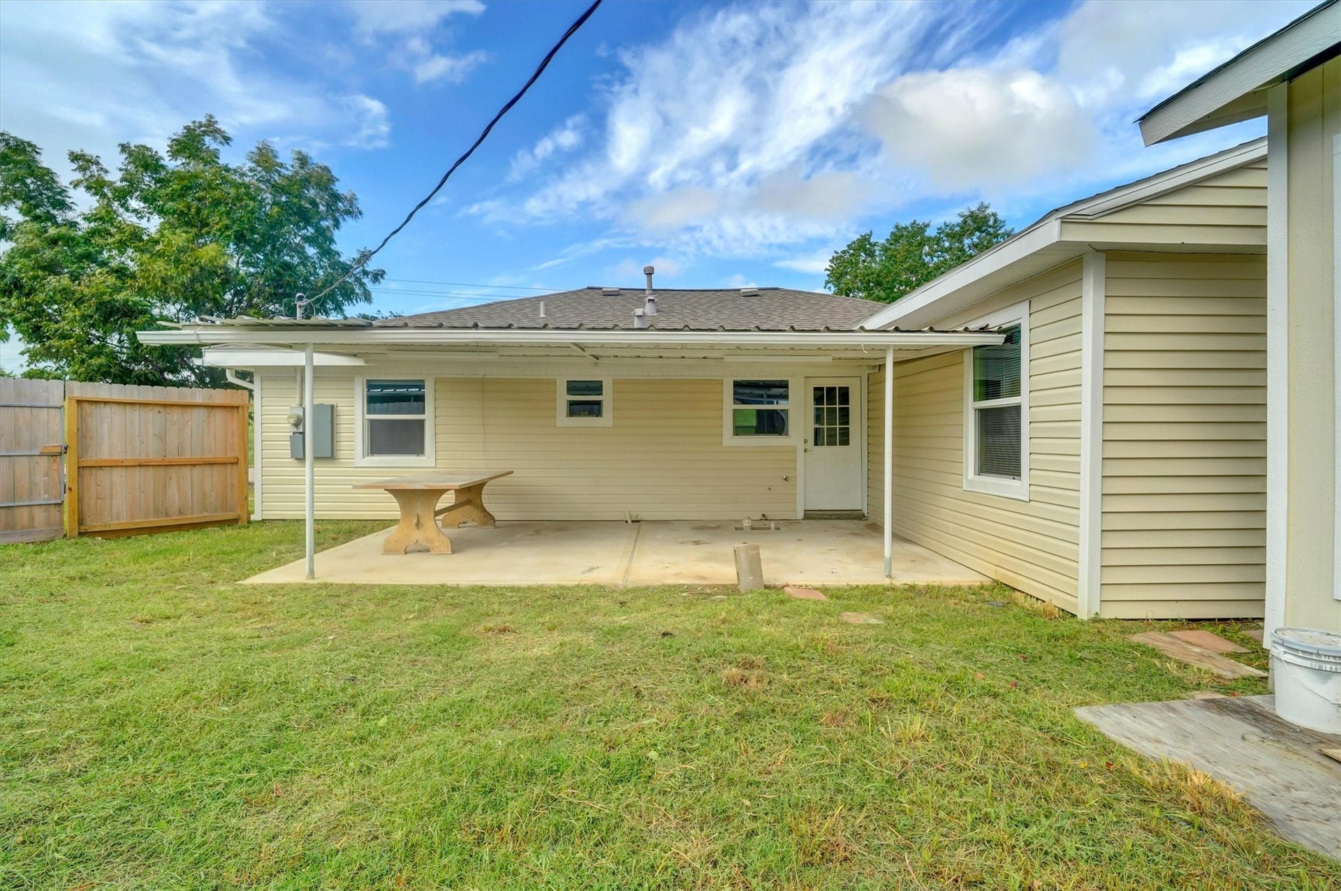 The fenced area offers privacy and a sense of seclusion.