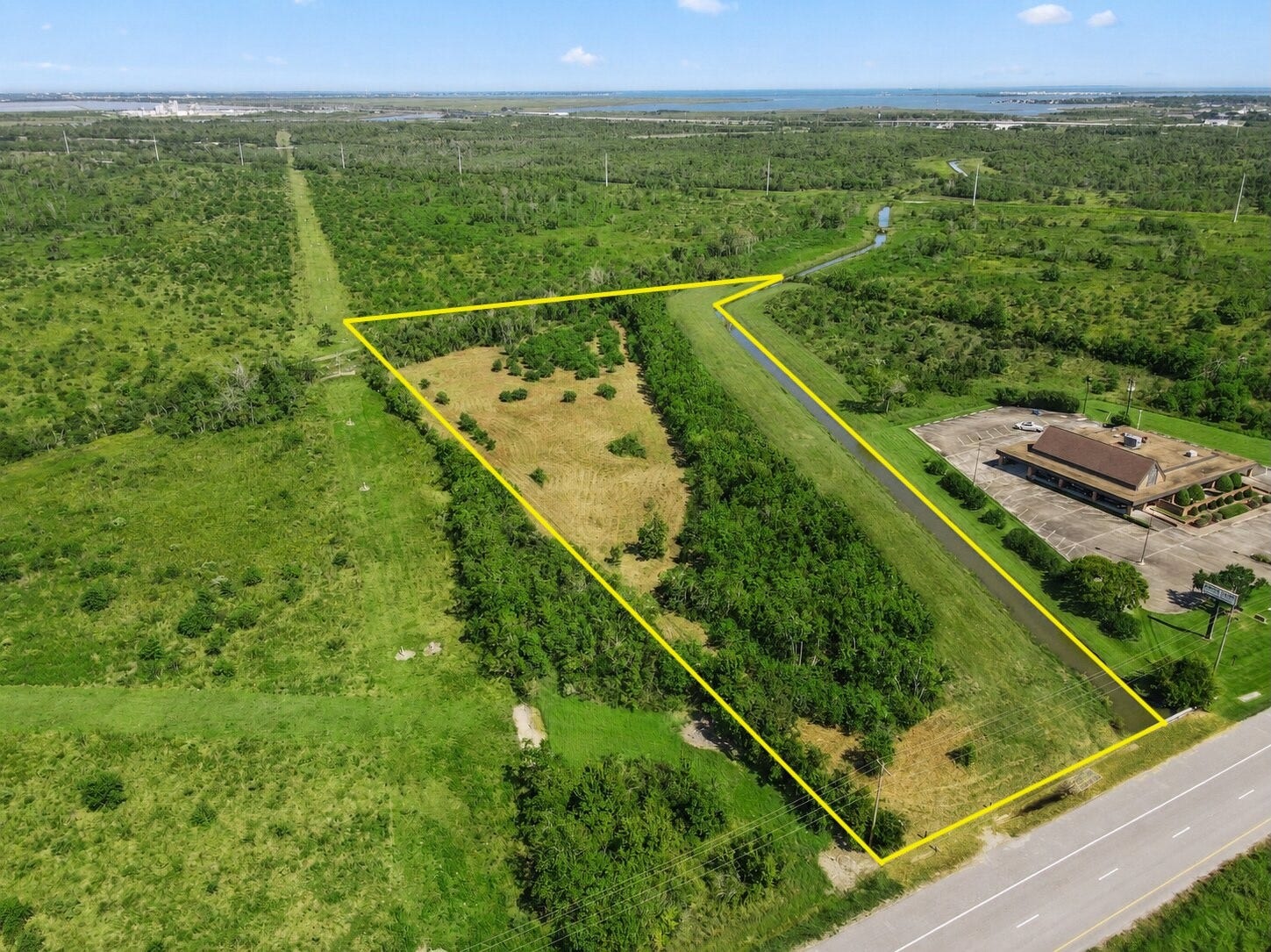 5130 Emmett F Lowry Expressway, Texas City, TX 77591 Yellow line is an estimate. Review survey for exact property line.