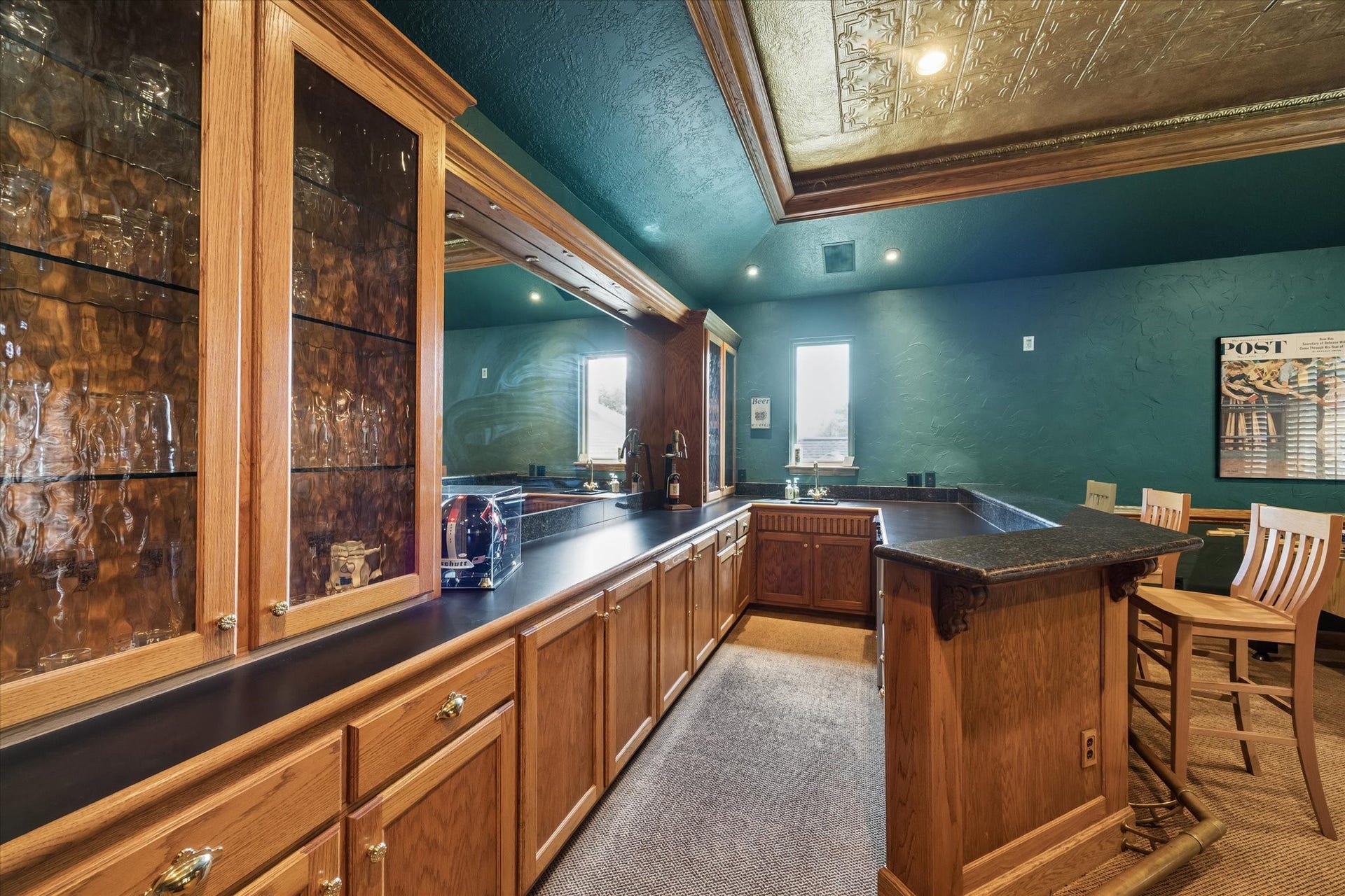 15106 Chestnut Glen Lane, Cypress, TX 77429 No need to miss a moment of the fun! With a custom wet bar, extensive cabinetry, and plenty of counter space, everything you need to keep guests refreshed is right where the action happens.