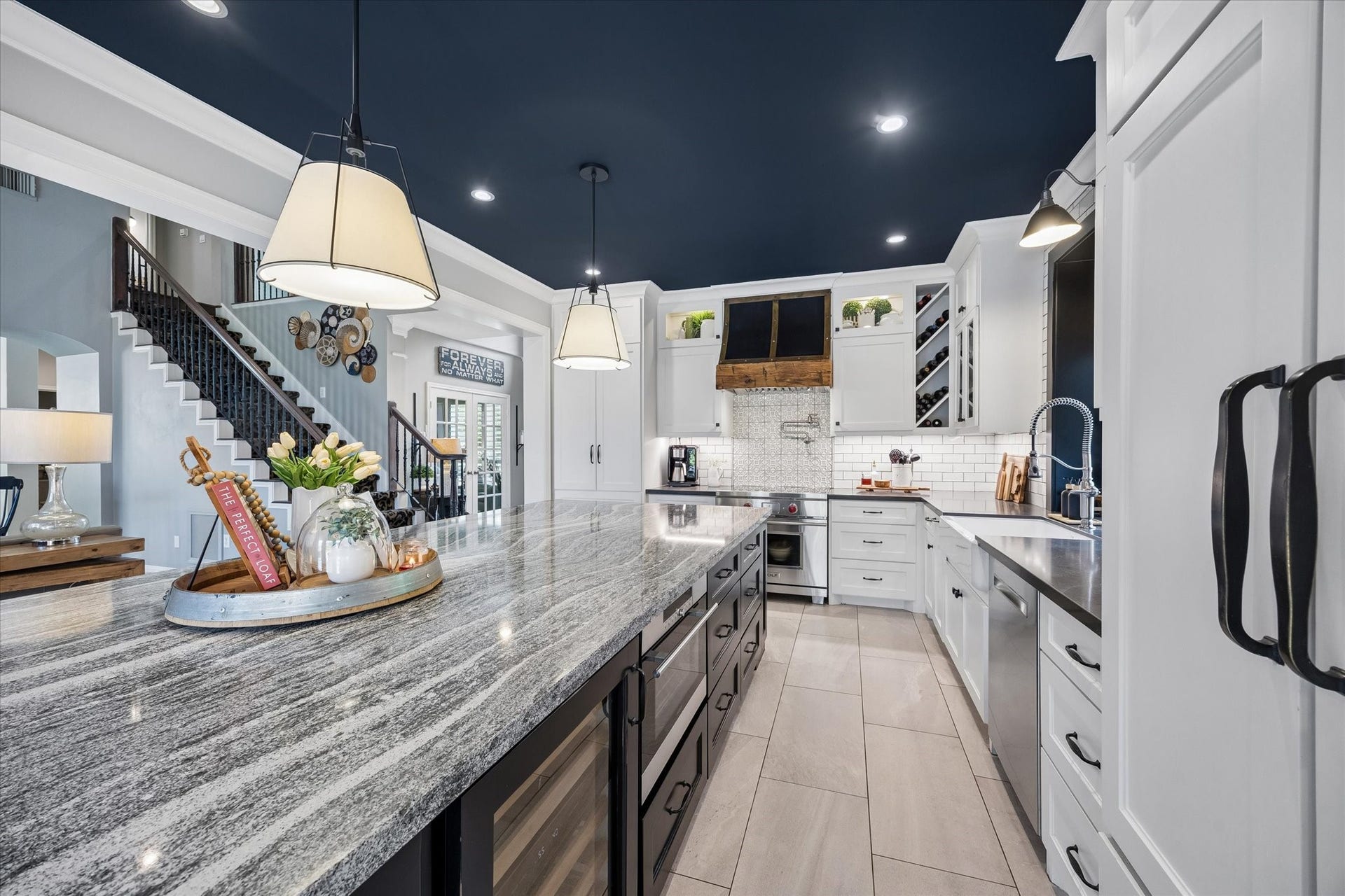 15106 Chestnut Glen Lane, Cypress, TX 77429 Imagine preparing your favorite meal while still being part of the conversation in the family room. The kitchen's thoughtful layout, beautiful finishes, and open connection to the living spaces make entertaining feel effortless.