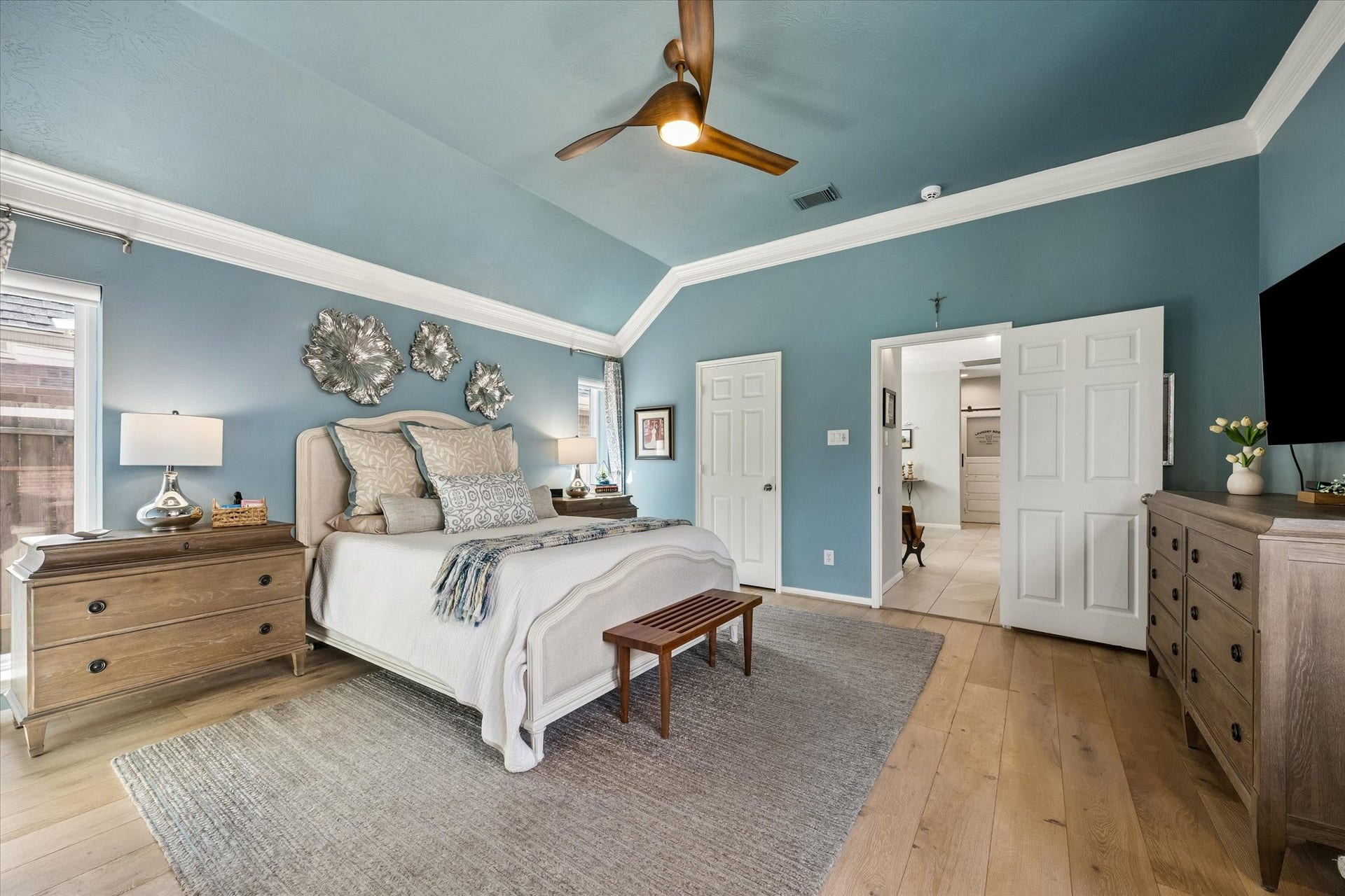 15106 Chestnut Glen Lane, Cypress, TX 77429 Imagine waking up without feeling rushed, enjoying a little quiet time before the day begins. This spacious primary bedroom offers room for comfortable furnishings and a relaxing atmosphere that feels like your own private escape.