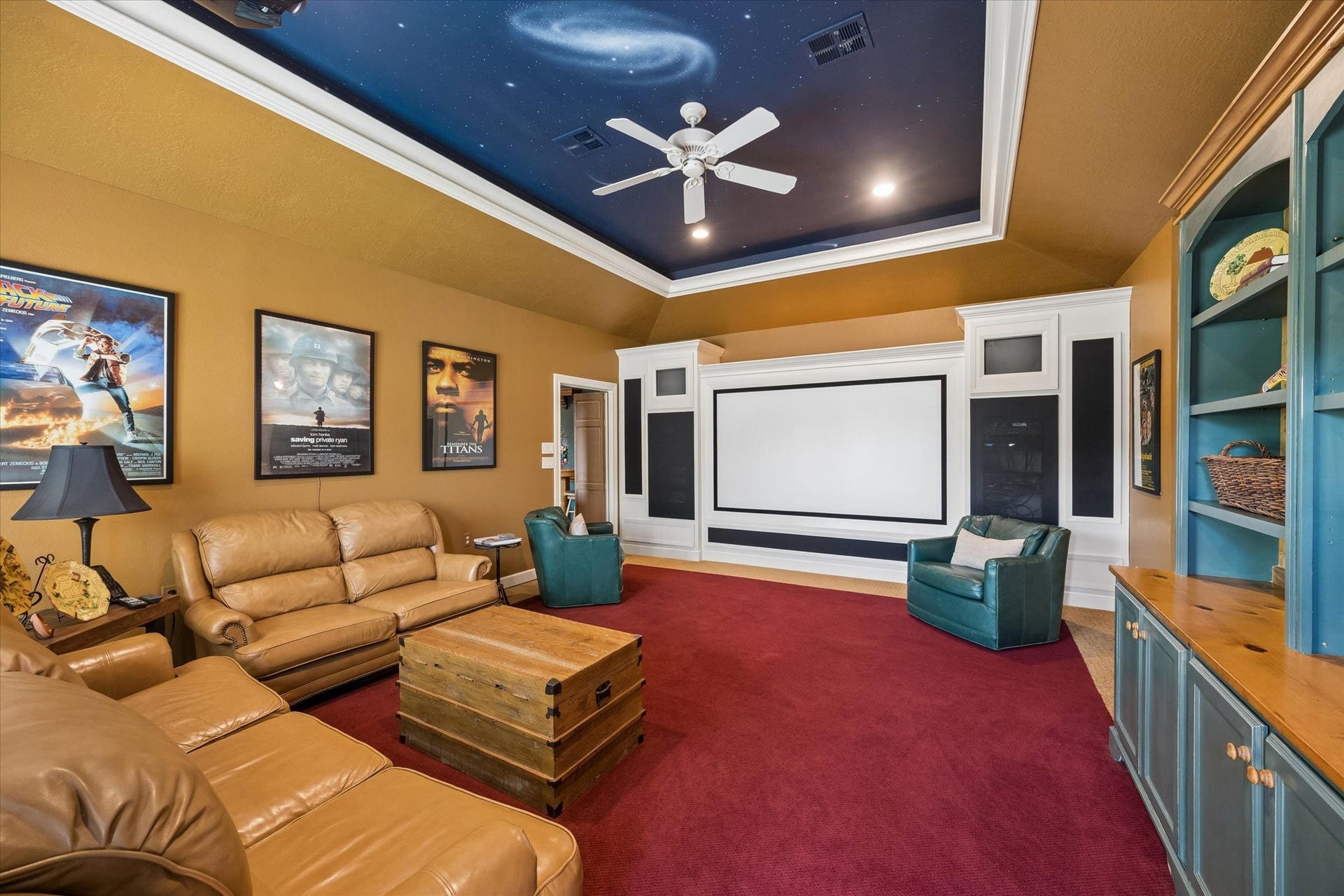 15106 Chestnut Glen Lane, Cypress, TX 77429 Settle into your favorite seat, dim the lights, and let the show begin. With a dramatic starry ceiling, projection screen, and custom built-ins, this room turns an ordinary movie night into something special.
