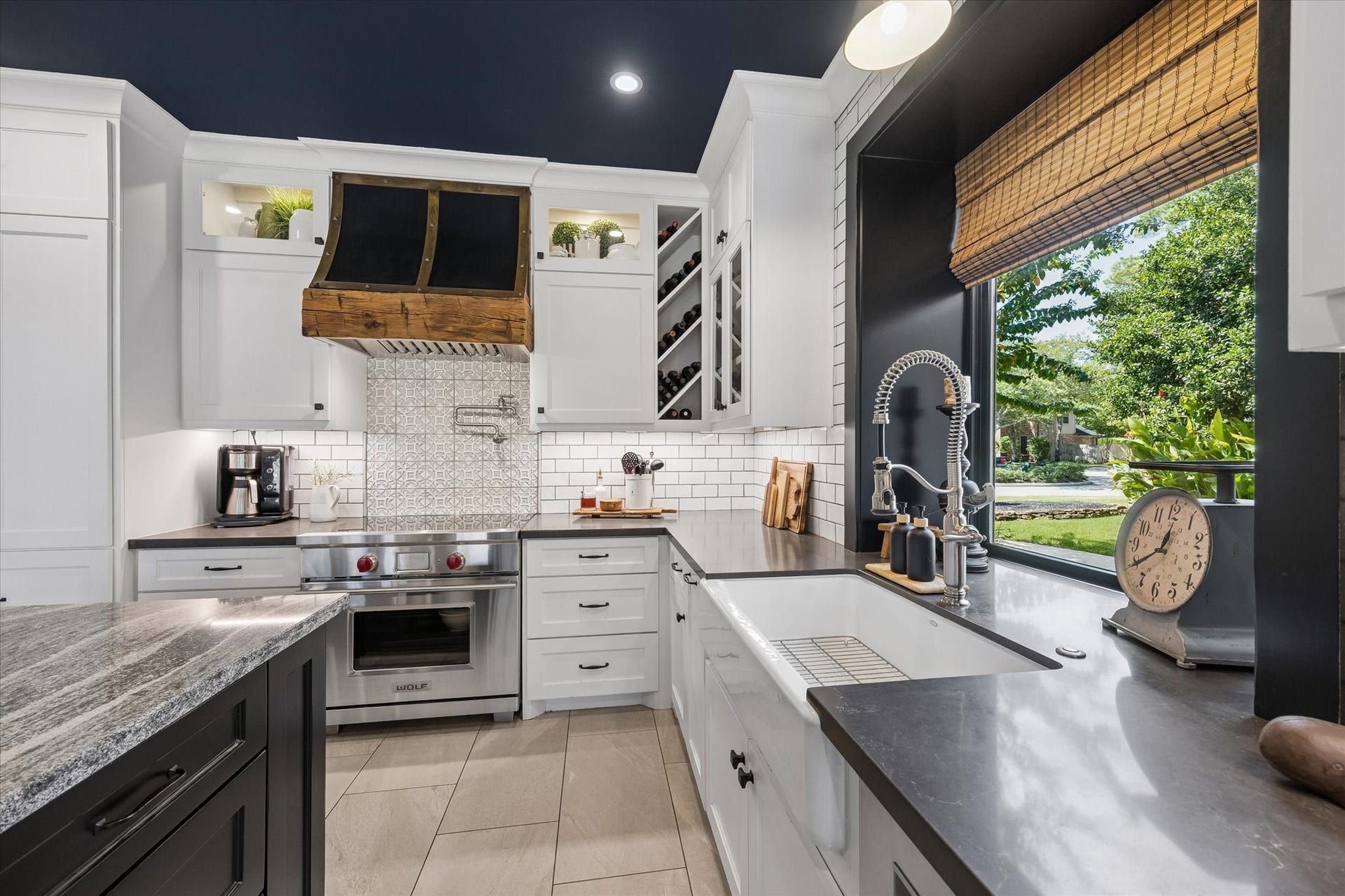 15106 Chestnut Glen Lane, Cypress, TX 77429 A little sunshine makes even the everyday tasks more enjoyable! Natural light brightens the kitchen workspace, while the conveniently positioned sink and surrounding cabinetry make meal preparation and cleanup feel effortless.