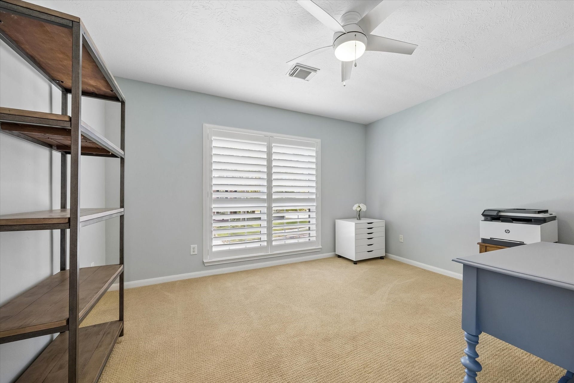 15106 Chestnut Glen Lane, Cypress, TX 77429 Everyone deserves a space of their own! This inviting secondary bedroom offers flexibility for family members or overnight guests, with room to create a comfortable retreat that reflects their personal style.