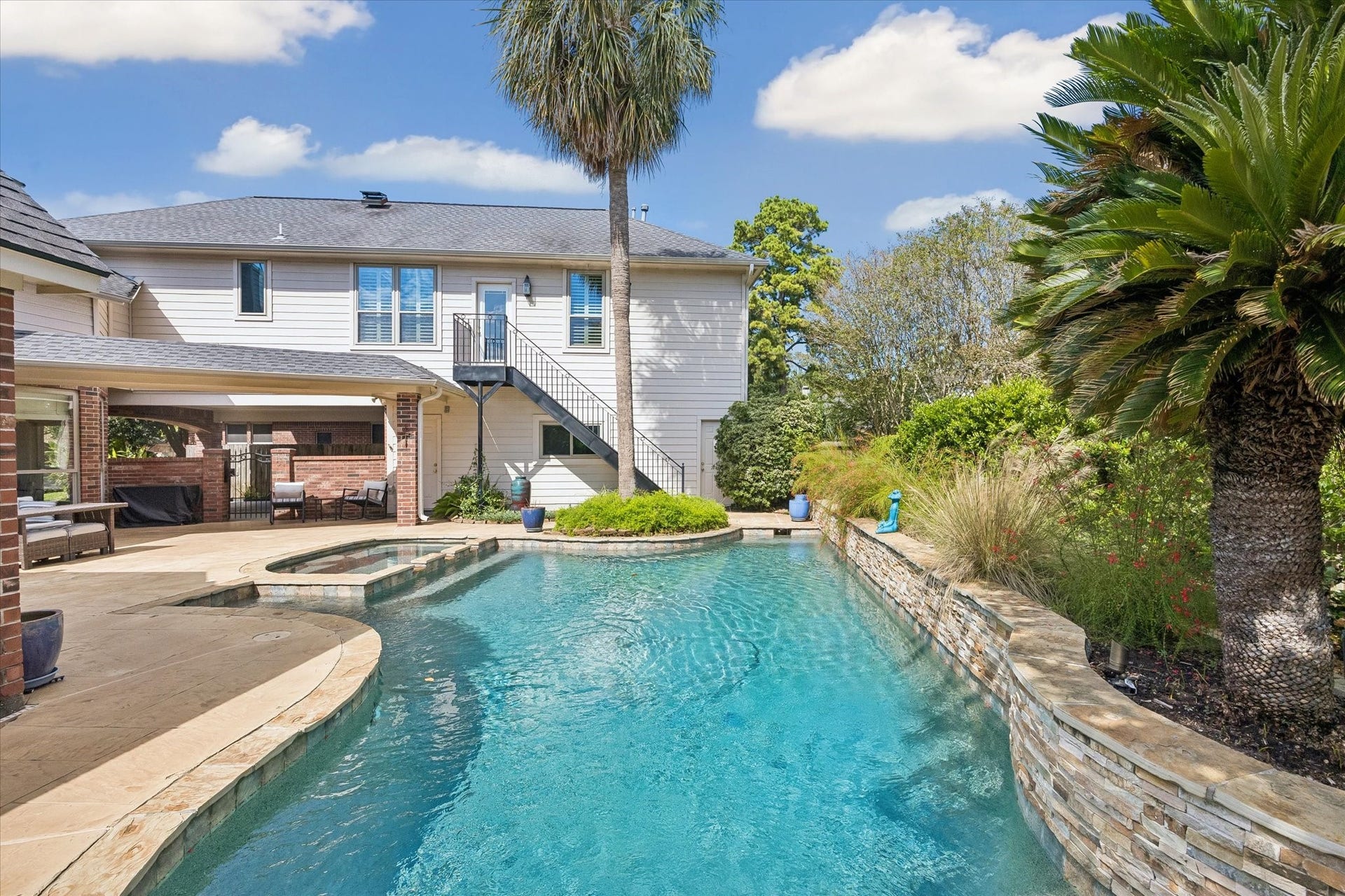 15106 Chestnut Glen Lane, Cypress, TX 77429 Imagine stepping outside on a beautiful afternoon and having all of this waiting for you. A sparkling pool, inviting spa, expansive patio, and outdoor living areas create a setting you'll want to enjoy every chance you get.