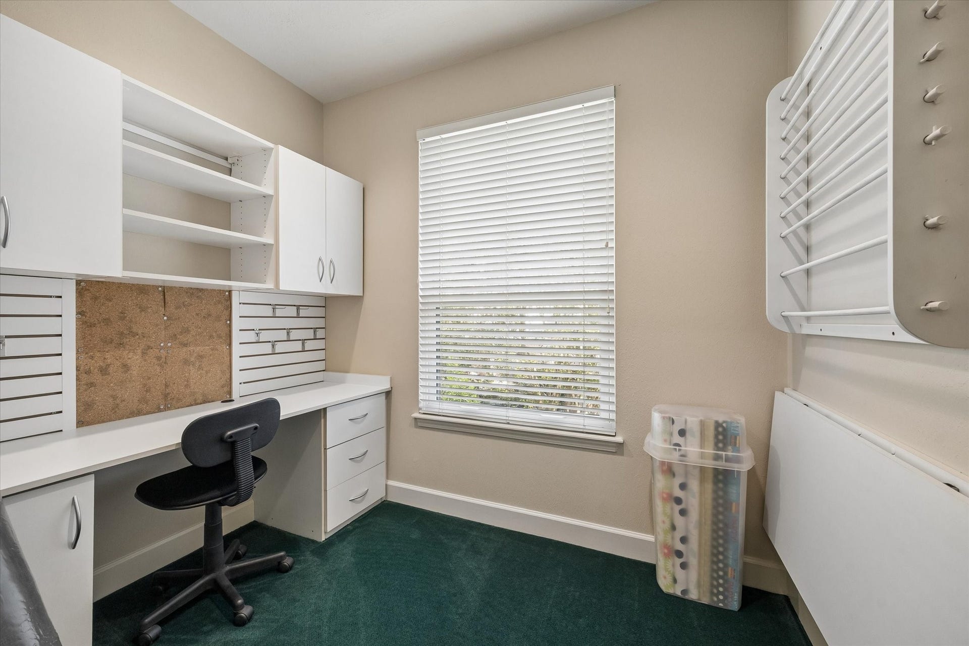 15106 Chestnut Glen Lane, Cypress, TX 77429 Whether you're working through your to-do list, wrapping gifts, or enjoying a favorite hobby, this dedicated workspace keeps everything within reach. Built-in cabinetry, shelving, and a spacious desk make staying organized effortless.