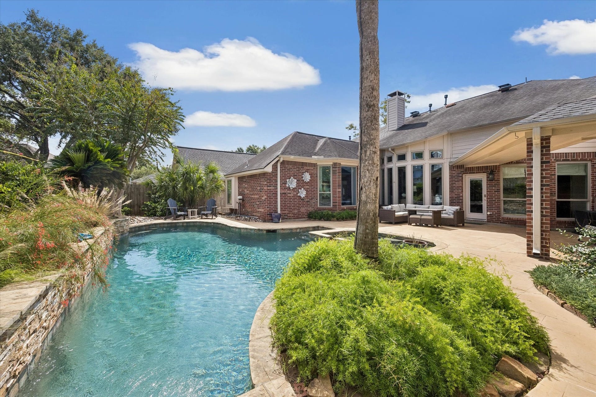 15106 Chestnut Glen Lane, Cypress, TX 77429 This is where weekends become something special. Whether you're hosting a pool party, enjoying a quiet morning surrounded by lush landscaping, or unwinding in the spa after sunset, this backyard is designed for making memories.