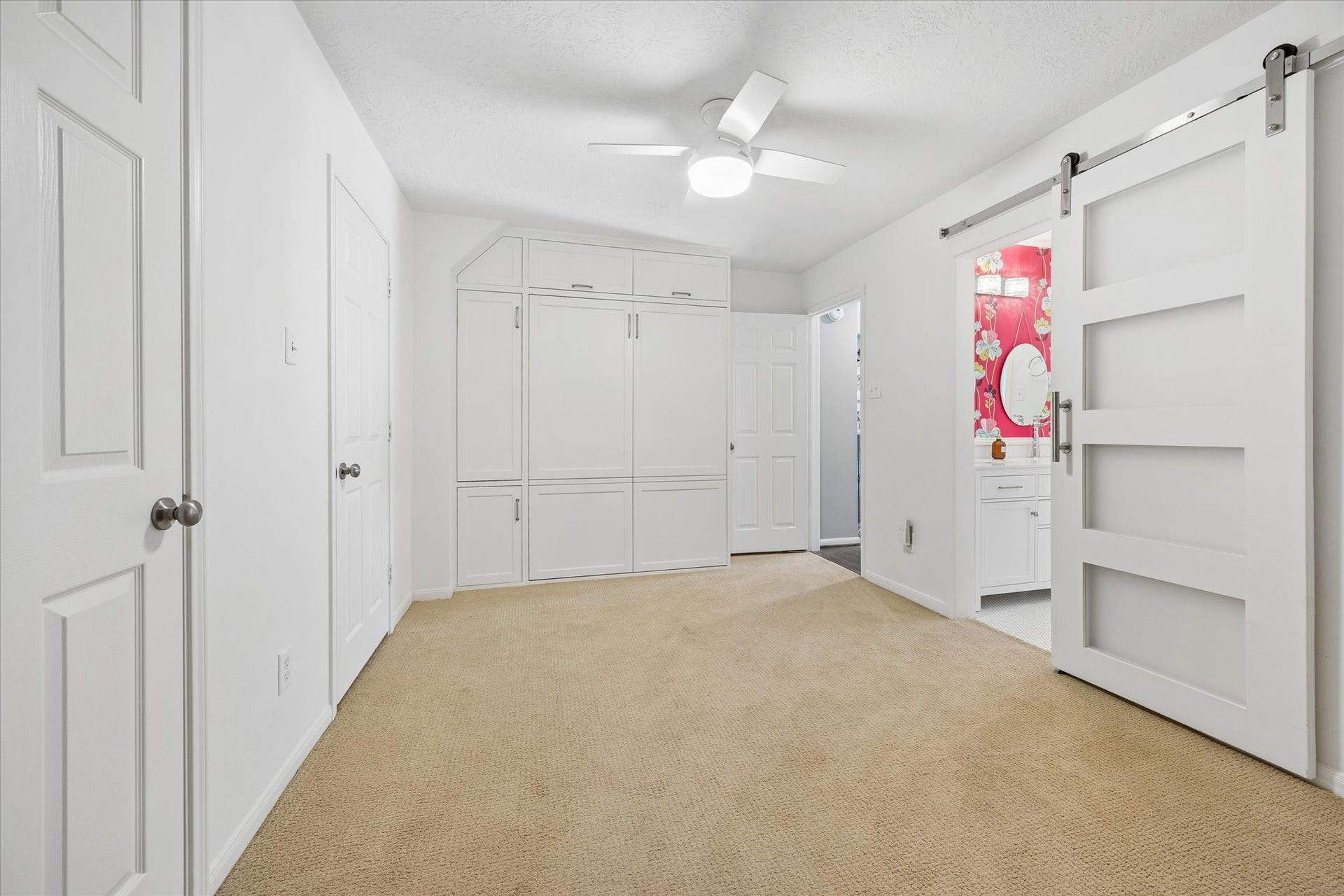 15106 Chestnut Glen Lane, Cypress, TX 77429 Need a space that can do double duty? This thoughtfully designed room features a built-in Murphy bed and generous cabinetry, giving you the freedom to welcome overnight guests while keeping the room open for everyday activities.