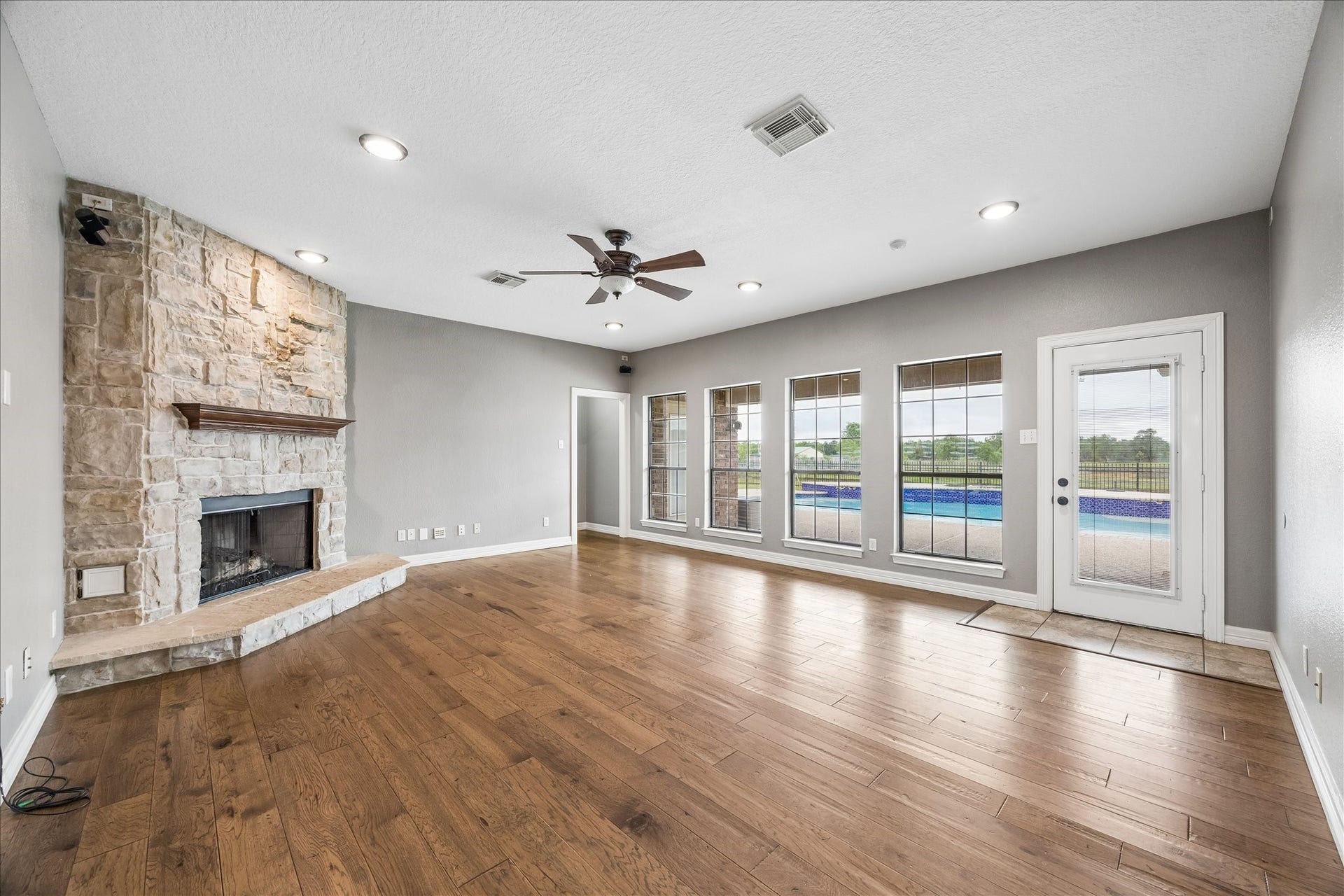 9102 N Humble Camp Road, Dickinson, TX 77539 Living room overlooks the pool.
