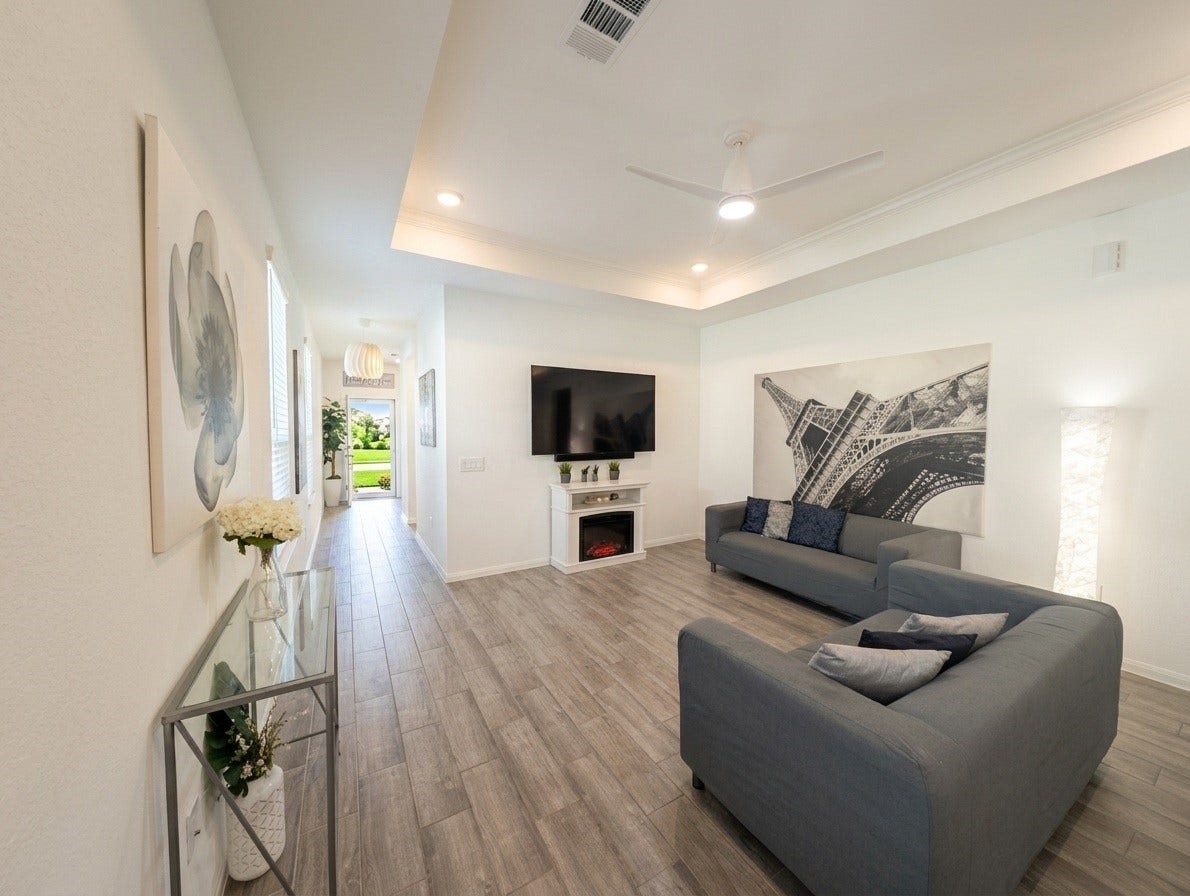 18122 Sonresa Way, Tomball, TX 77377 Open-concept living area view highlighting the neutral color palette and seamless flow.