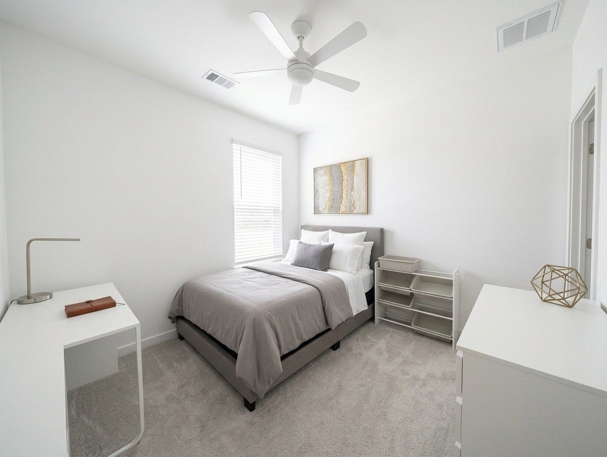 18122 Sonresa Way, Tomball, TX 77377 Well-lit guest bedroom featuring a neutral color palette, ceiling fan, and cozy ambiance.