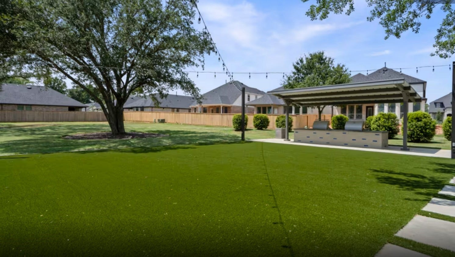 18122 Sonresa Way, Tomball, TX 77377 Scenic view of the community recreational area and open green spaces.