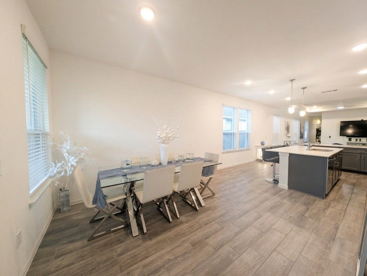 18122 Sonresa Way, Tomball, TX 77377 Expansive open-concept living, dining, and kitchen combination ideal for entertaining.