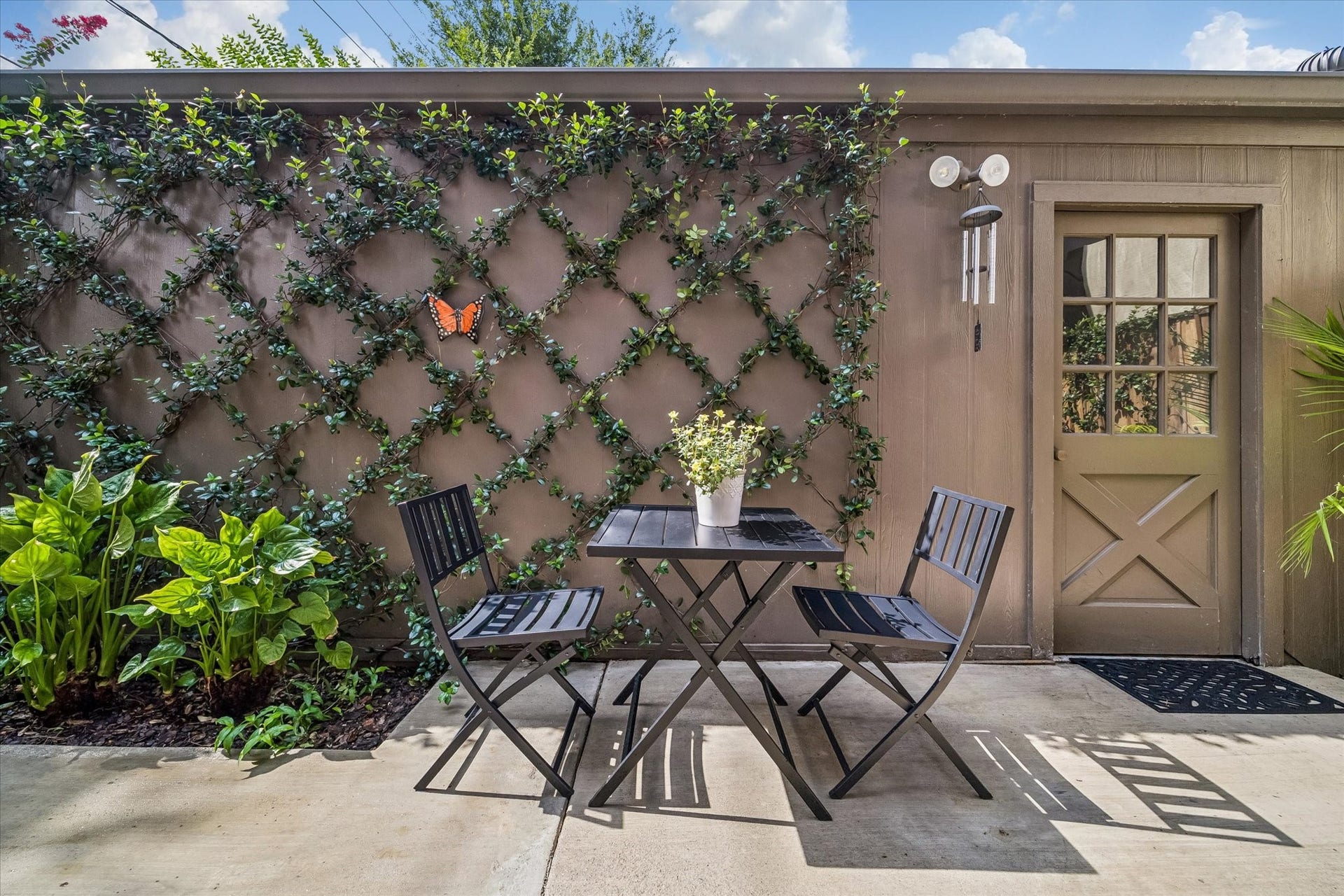 Beautifully trellised wall, perfect for intimate gatherings or relaxing moments.