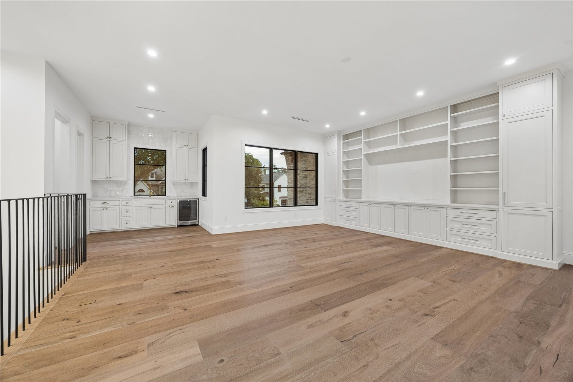 7719 Bryonwood Drive, Houston, TX 77055 Wall-to-wall built-ins give the game room plenty of display and storage space.