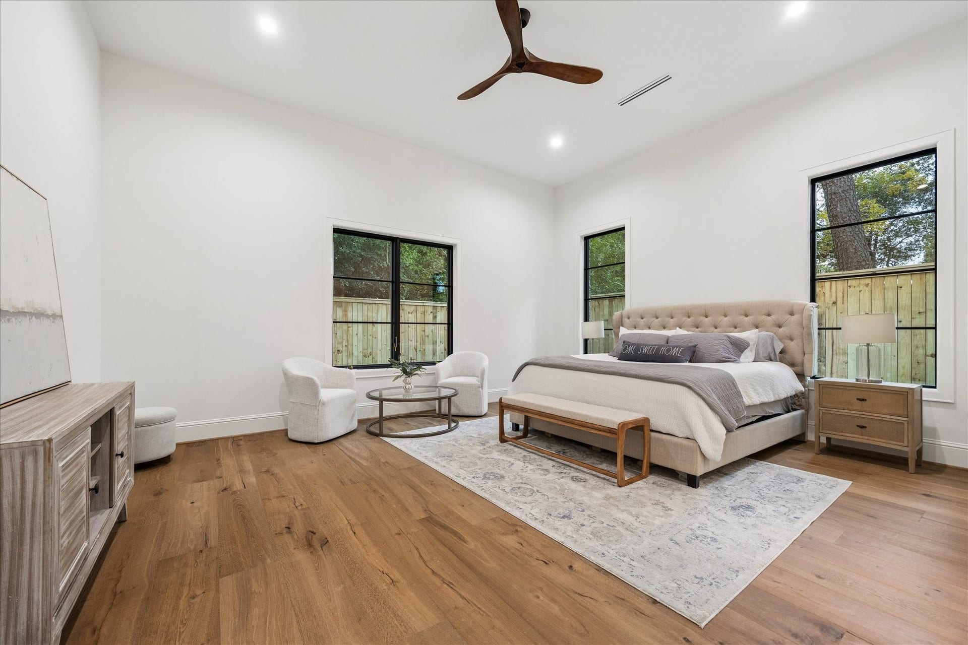 7719 Bryonwood Drive, Houston, TX 77055 The first-floor primary suite offers soaring ceilings and backyard views.