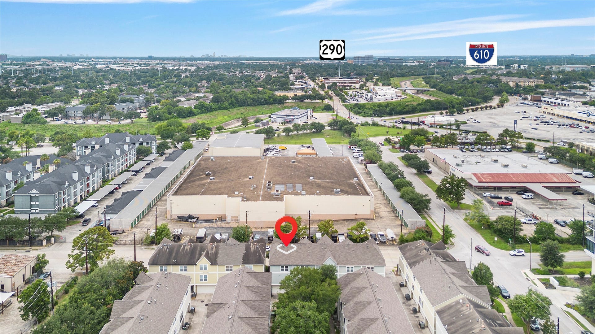 1712 Bevis Street, Houston, TX 77008 Aerial view showcasing the surrounding Houston skyline and convenient location near major roadways, making it easy to access Downtown and other popular areas of the city.