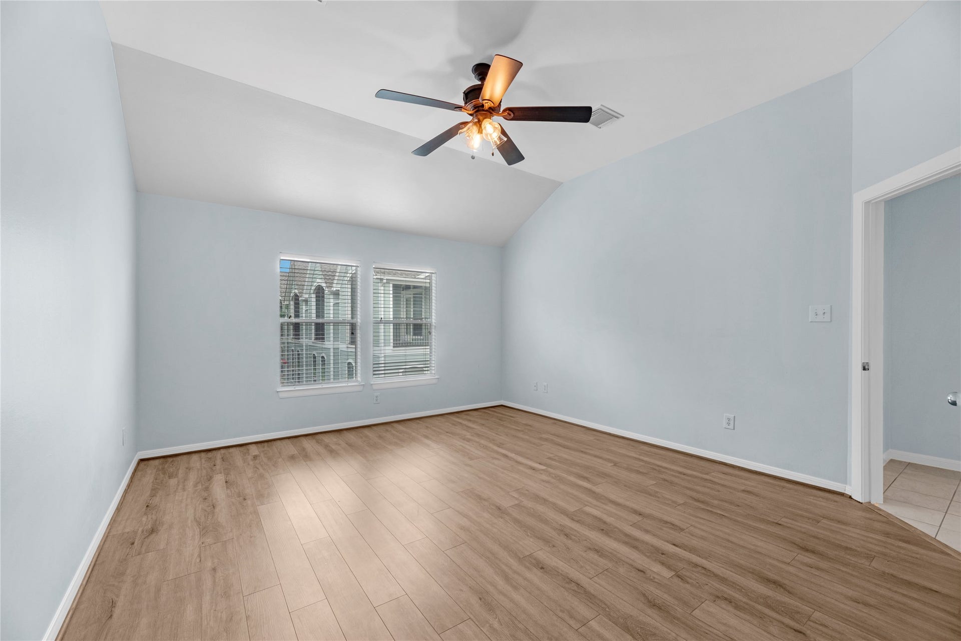 1712 Bevis Street, Houston, TX 77008 This spacious bedroom offers an open layout with plenty of room to create a comfortable sleeping area while still allowing space for additional furniture, a sitting area, or workspace.