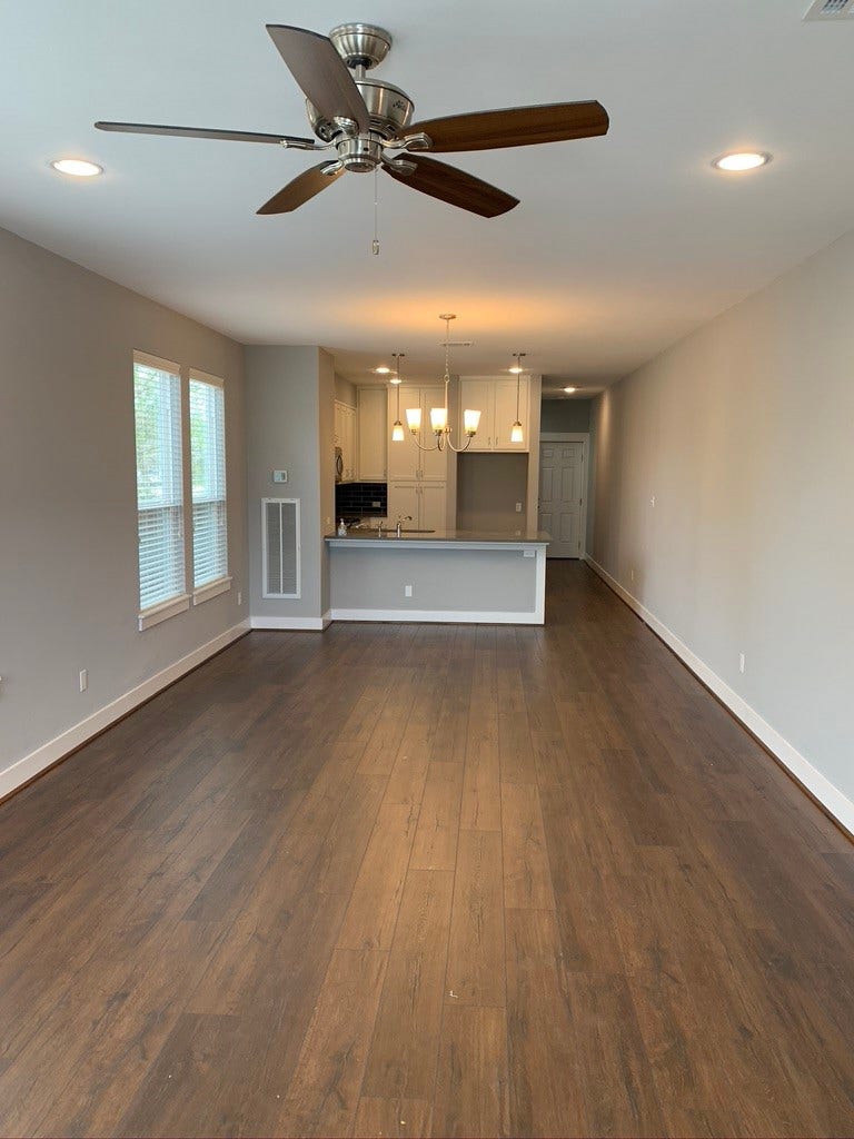 2509 S Grand Boulevard, Pearland, TX 77581 Unit A Family room open to kitchen