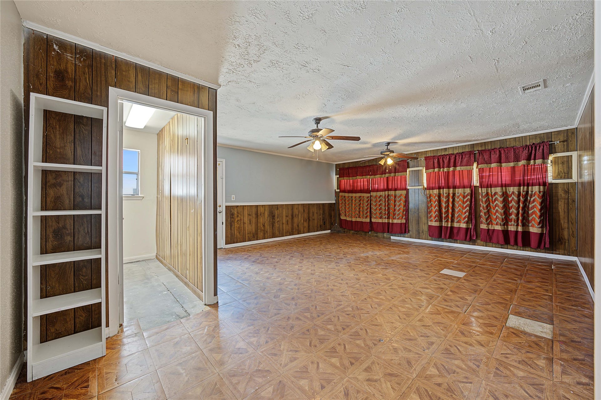 7510 Baneway Drive, Houston, TX 77072 Large den or secondary living space showcasing freshly painted walls and great character.