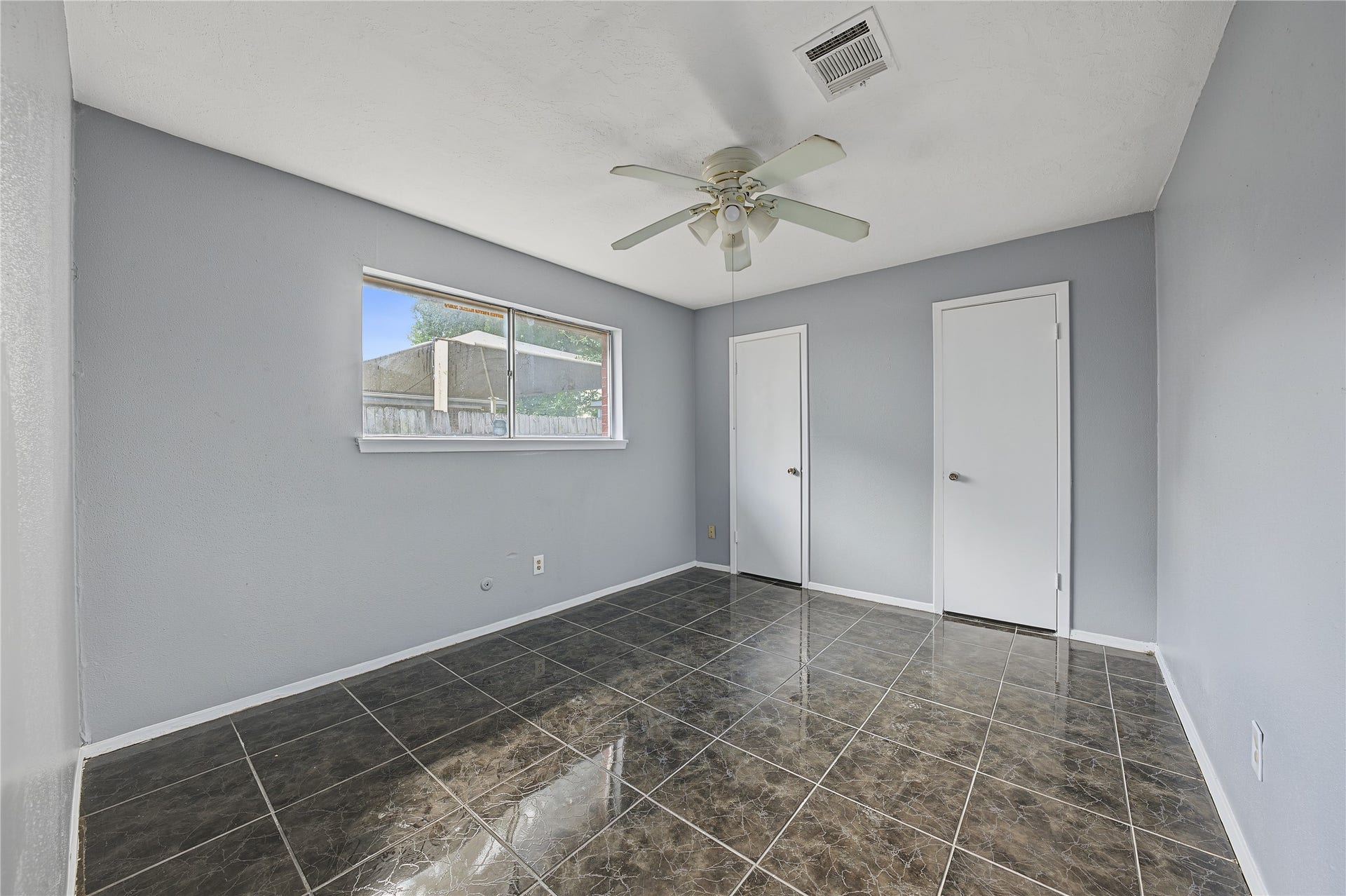 7510 Baneway Drive, Houston, TX 77072 Secondary room with freshly painted walls, ready for your customization.