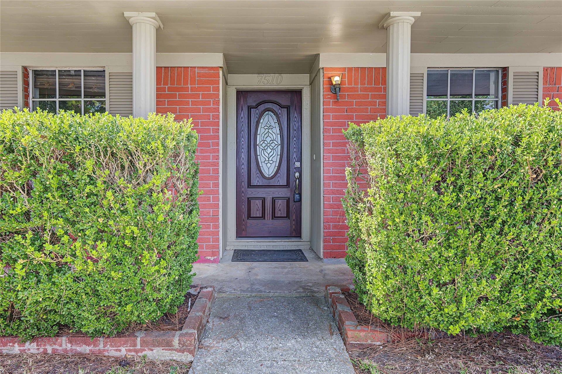 7510 Baneway Drive, Houston, TX 77072 Inviting front entryway featuring a charming brick facade and fresh curb appeal.