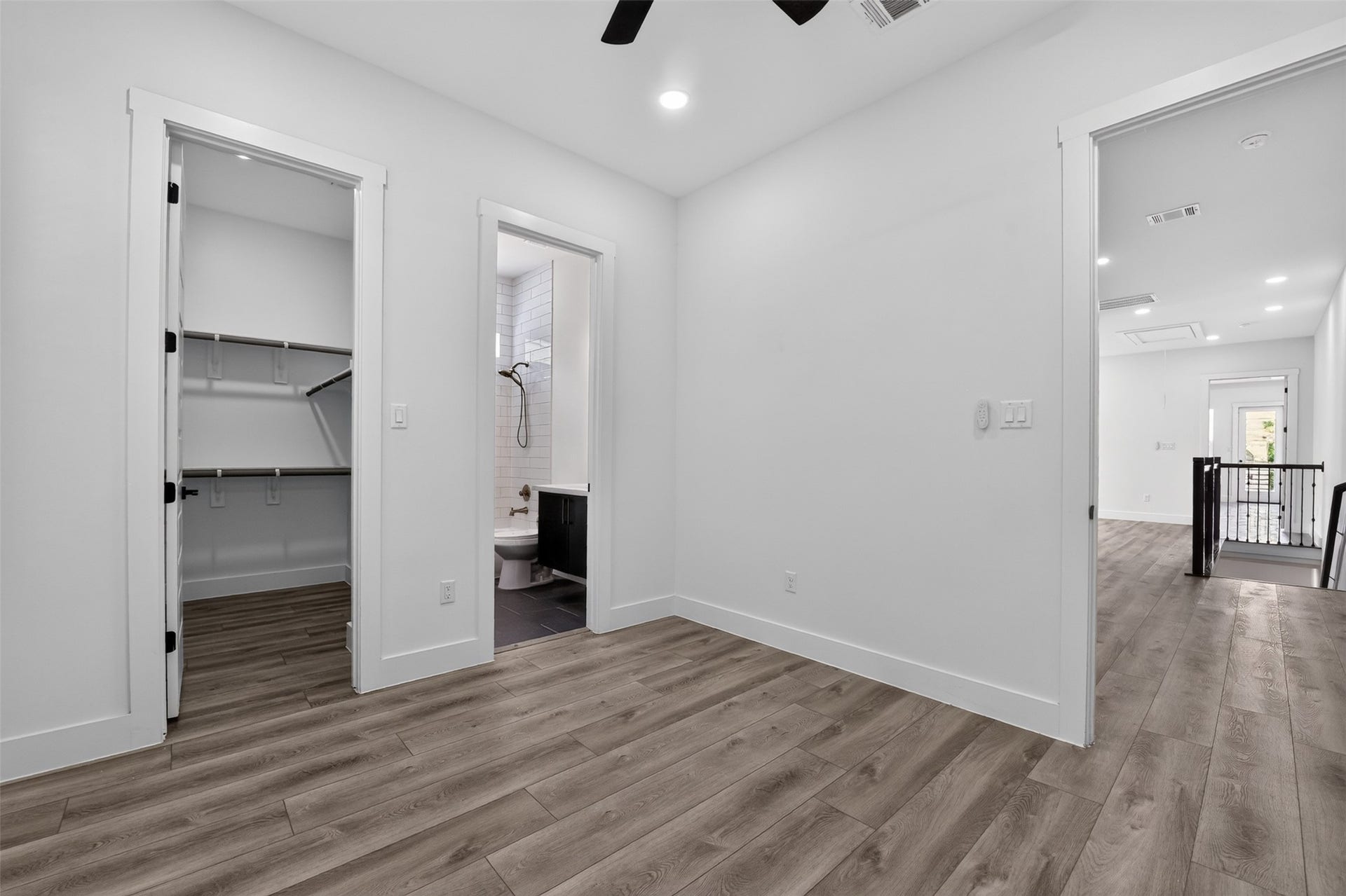 2911 Wichita Street, Houston, TX 77004 Perfectly suited for family, guests, or a private retreat, this secondary bedroom features generous storage and a well-appointed ensuite bath.