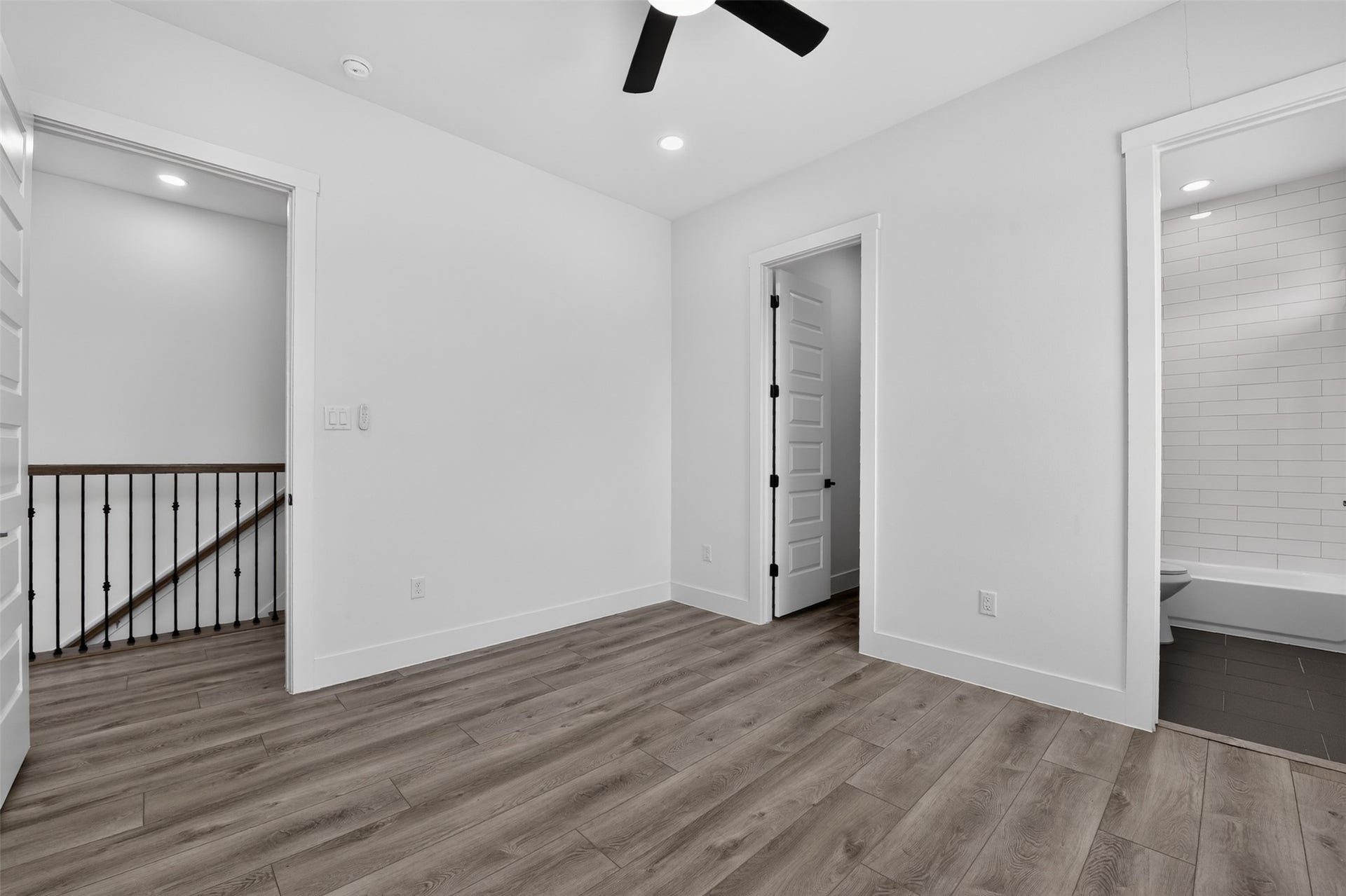 2911 Wichita Street, Houston, TX 77004 The second beautifully appointed secondary bedroom, thoughtfully positioned near the versatile flex space offers a comfortable private retreat for family or guests.