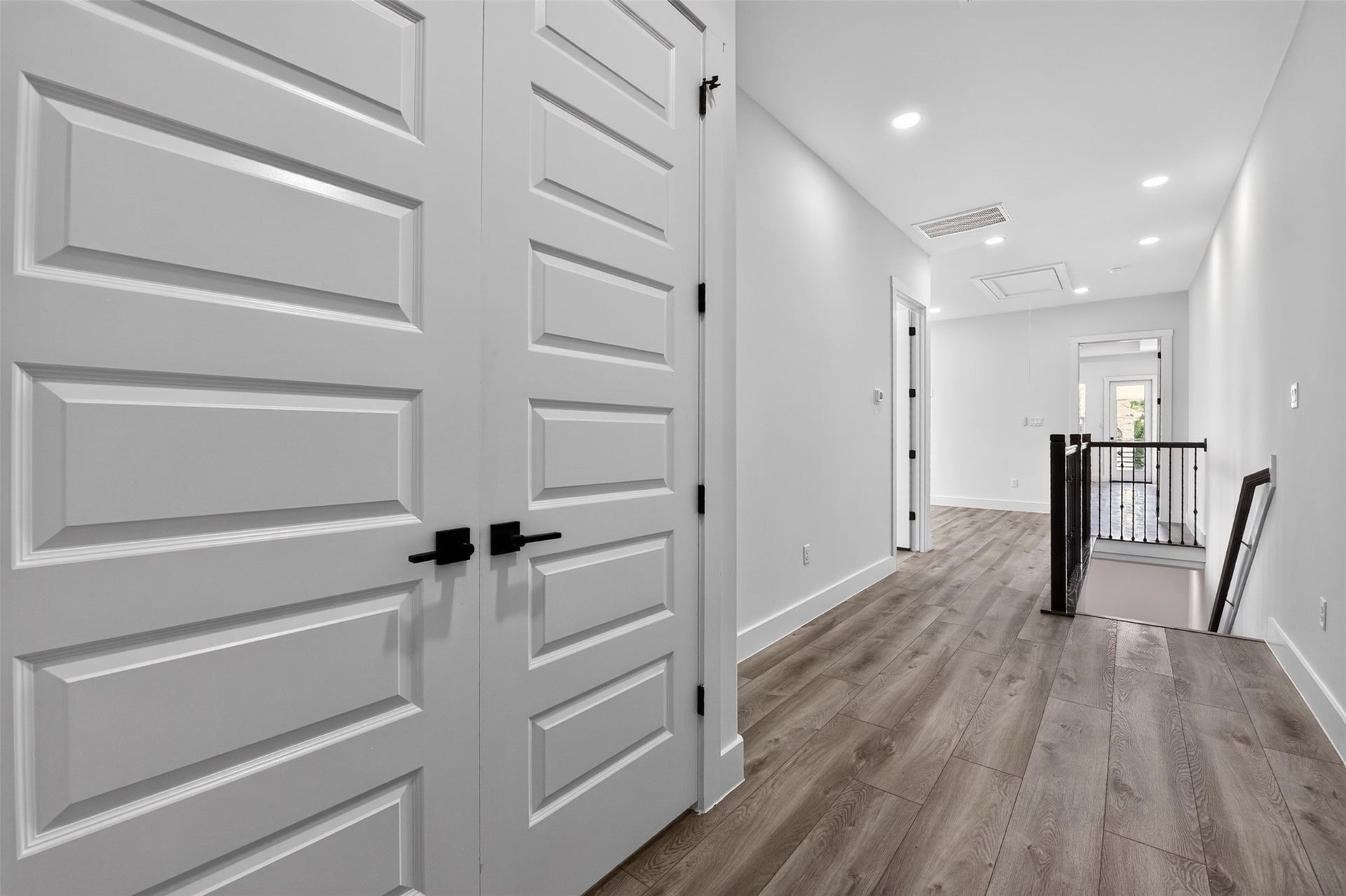 2911 Wichita Street, Houston, TX 77004 An inviting transition between spaces, the staircase leads to the well-appointed second floor with comfortable bedroom accommodations and a practical utility area.