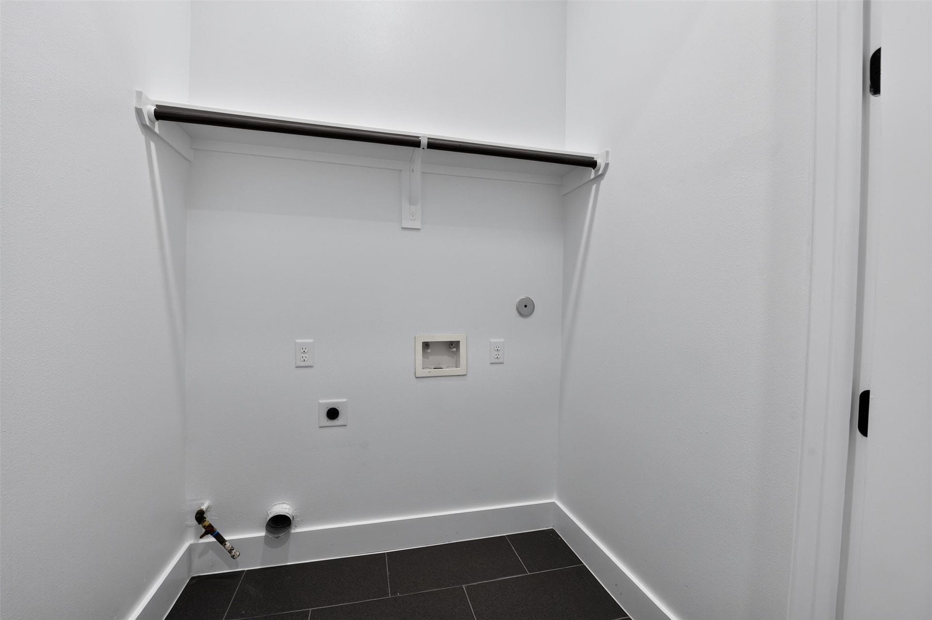 2911 Wichita Street, Houston, TX 77004 A smartly designed utility space provides added convenience, blending functionality and accessibility into the homes thoughtful second-floor layout
