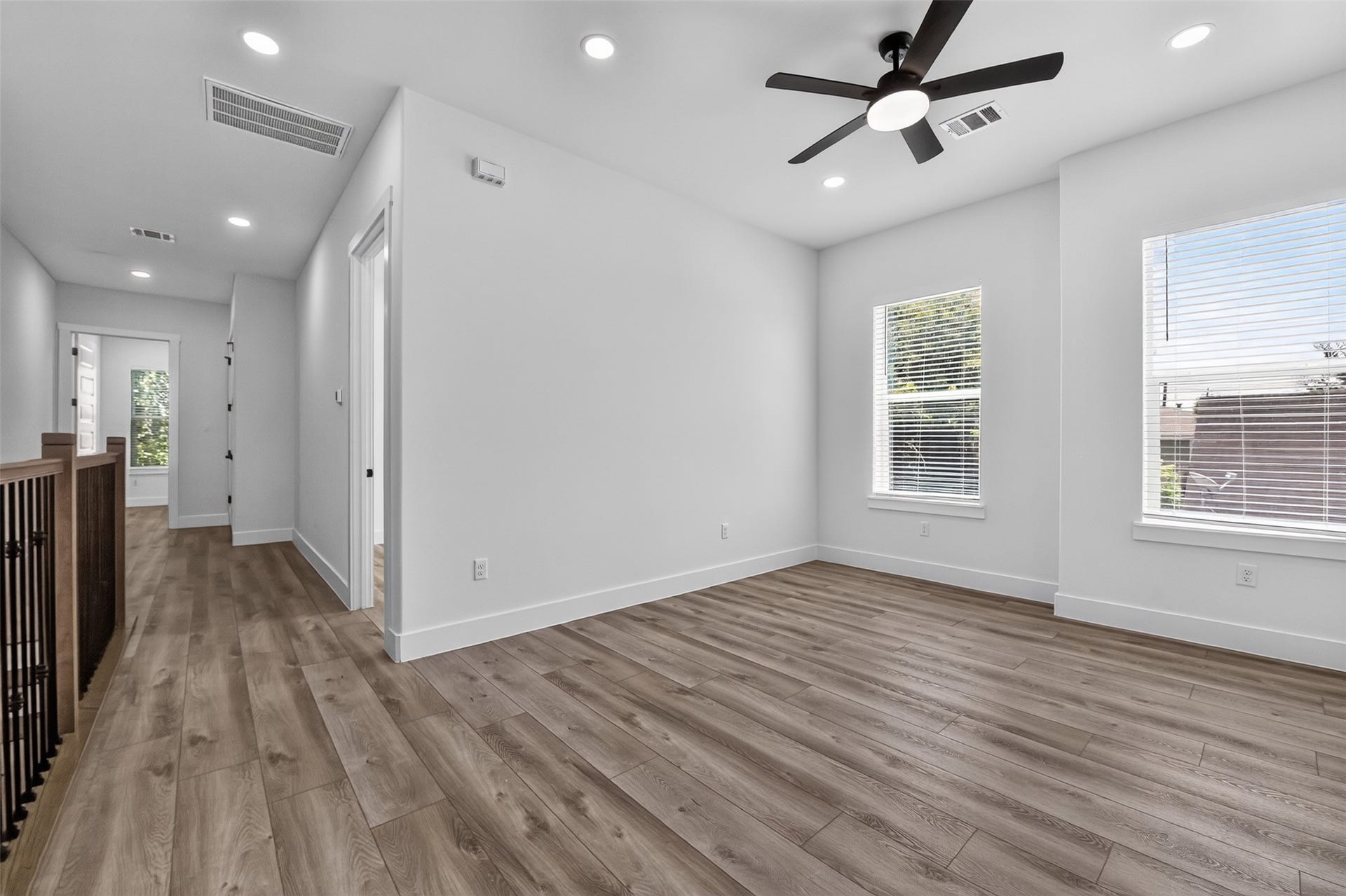 2911 Wichita Street, Houston, TX 77004 Flooded with sunlight, this exceptional flex space showcases a wall of windows and offers endless possibilitiesfrom a sophisticated home office to a cozy lounge, creative studio, or family retreat.