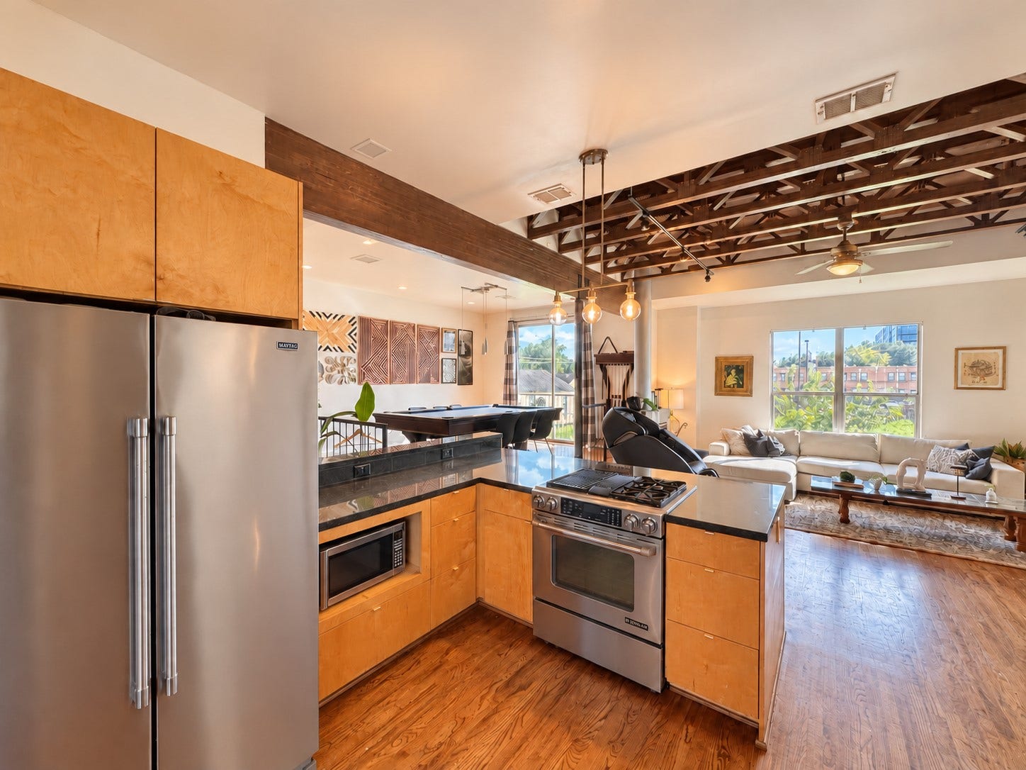 Modern kitchen with stainless steel appliances, ample cabinetry, and everything needed for everyday cooking.