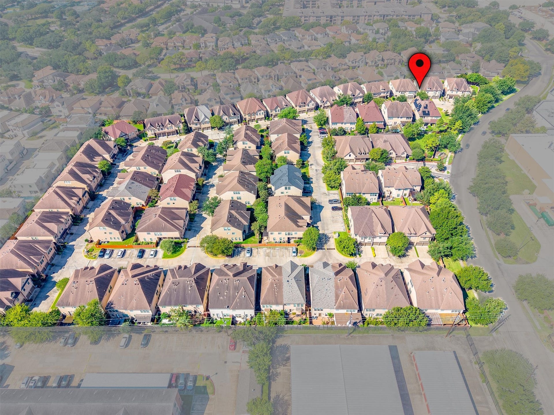 2919 Royal Oaks Crest, Houston, TX 77082 Charming townhouse community with neatly lined residences and lush greenery, offering a serene and welcoming neighborhood atmosphere.
