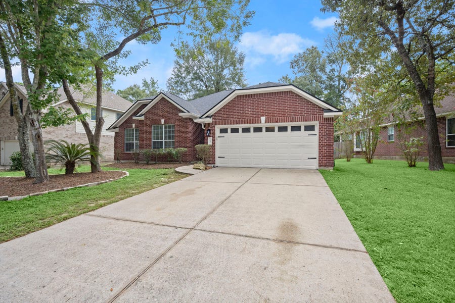 Property photo for 34 S Rambling Ridge Place, Conroe, TX