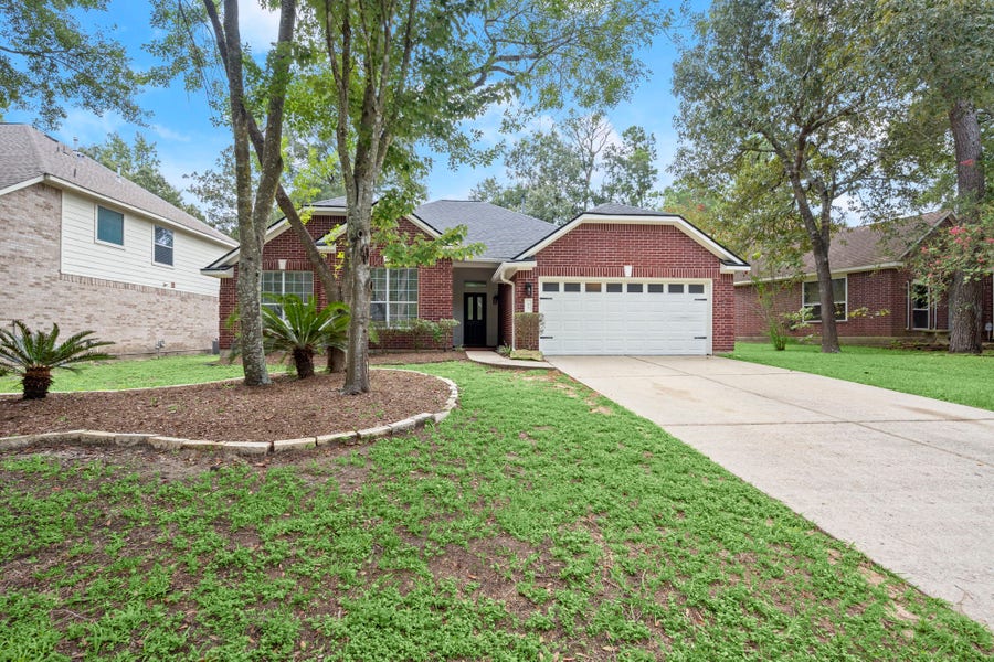 Property photo for 34 S Rambling Ridge Place, Conroe, TX