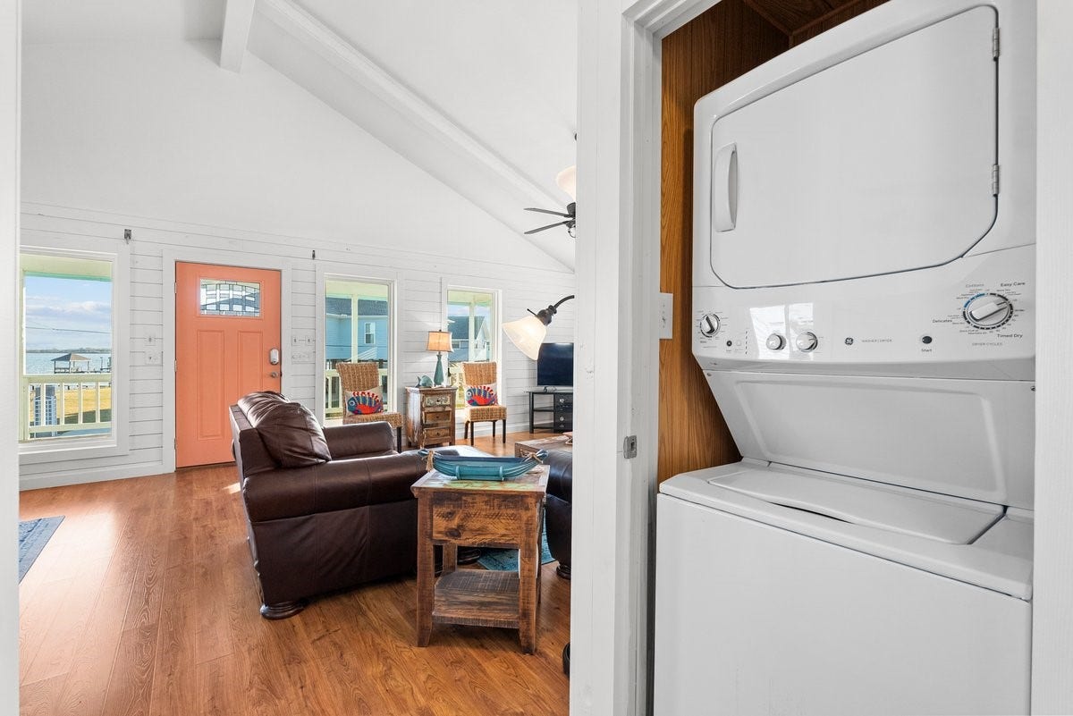 2406 Avenue P, San Leon, TX 77539 Features a convenient in-unit washer and dryer.
